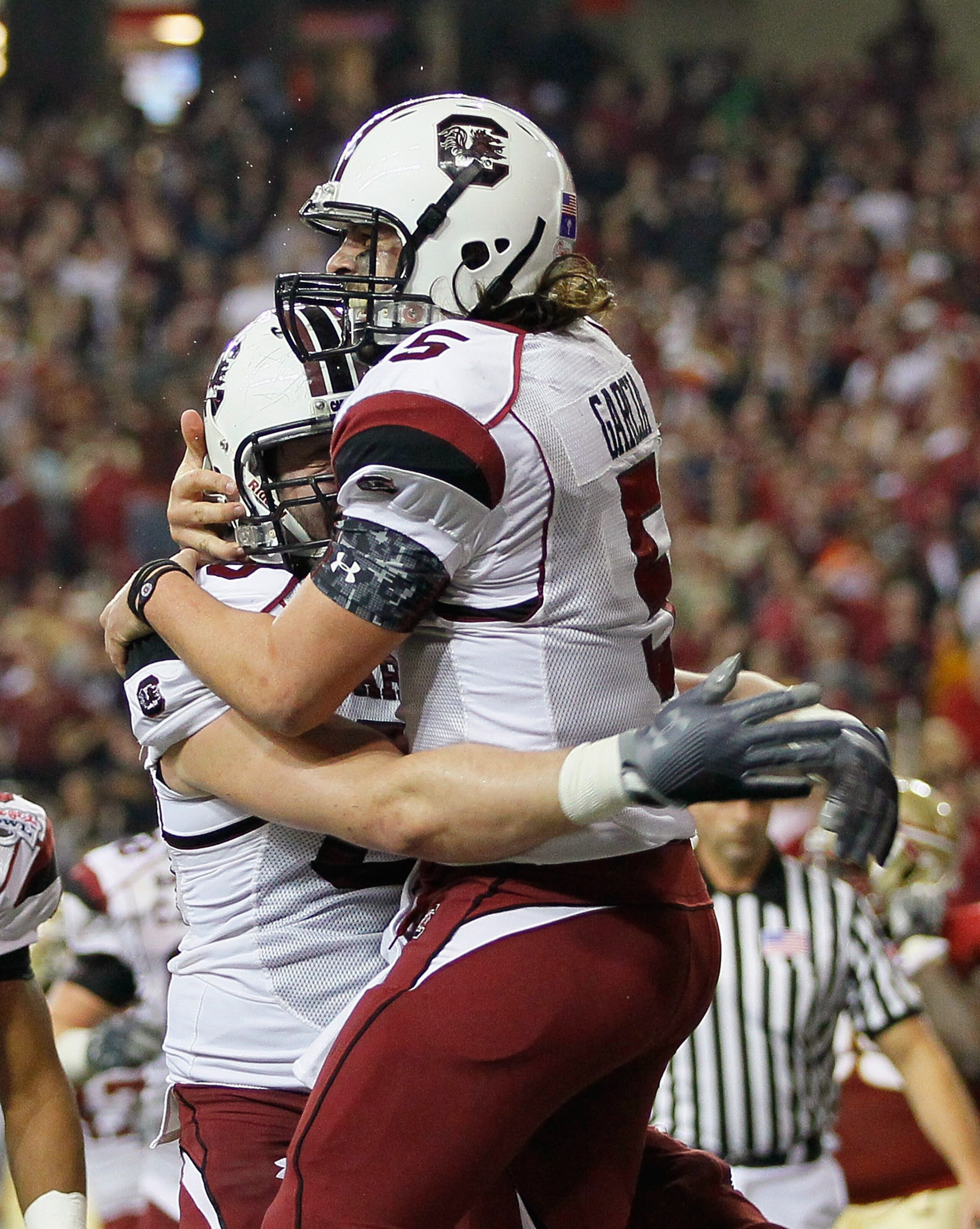 ATLANTA, GA - DECEMBER 31:  Quarterback Stephen Garcia #5 of the South Carolina Gamecocks reacts after scoring a touchdown against the Florida State Seminoles with Hutch Eckerson #66 during the 2010 Chick-fil-A Bowl at Georgia Dome on December 31, 2010 in