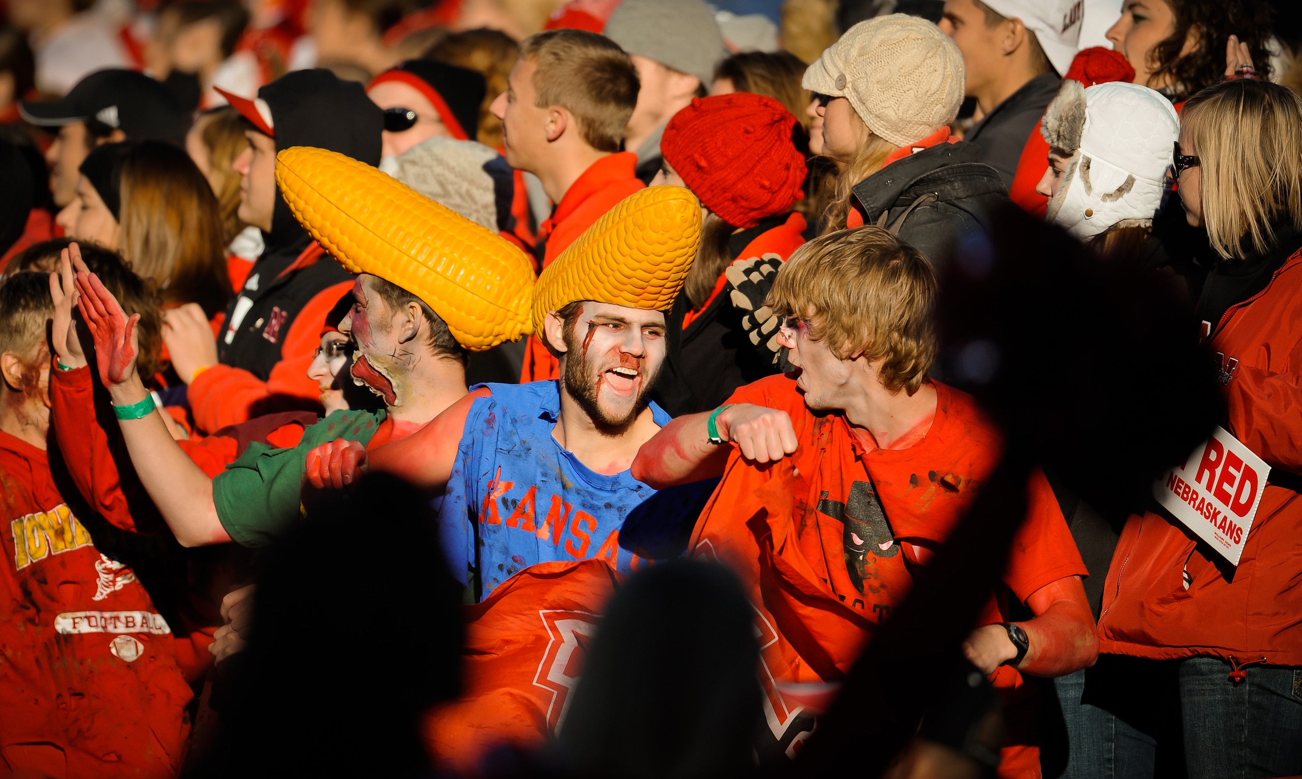 LINCOLN, NE - NOVEMBER 26: Nebraska Cornhusker fans celebrate another touchdown during their game against the Colorado Buffaloes at Memorial Stadium on November 26, 2010 in Lincoln, Nebraska. Nebraska defeated Colorado 45-17 (Photo by Eric Francis/Getty I LINCOLN, NE - NOVEMBER 26: Nebraska Cornhusker fans celebrate another touchdown during their game against the Colorado Buffaloes at Memorial Stadium on November 26, 2010 in Lincoln, Nebraska. Nebraska defeated Colorado 45-17 (Photo by Eric Francis/Getty I