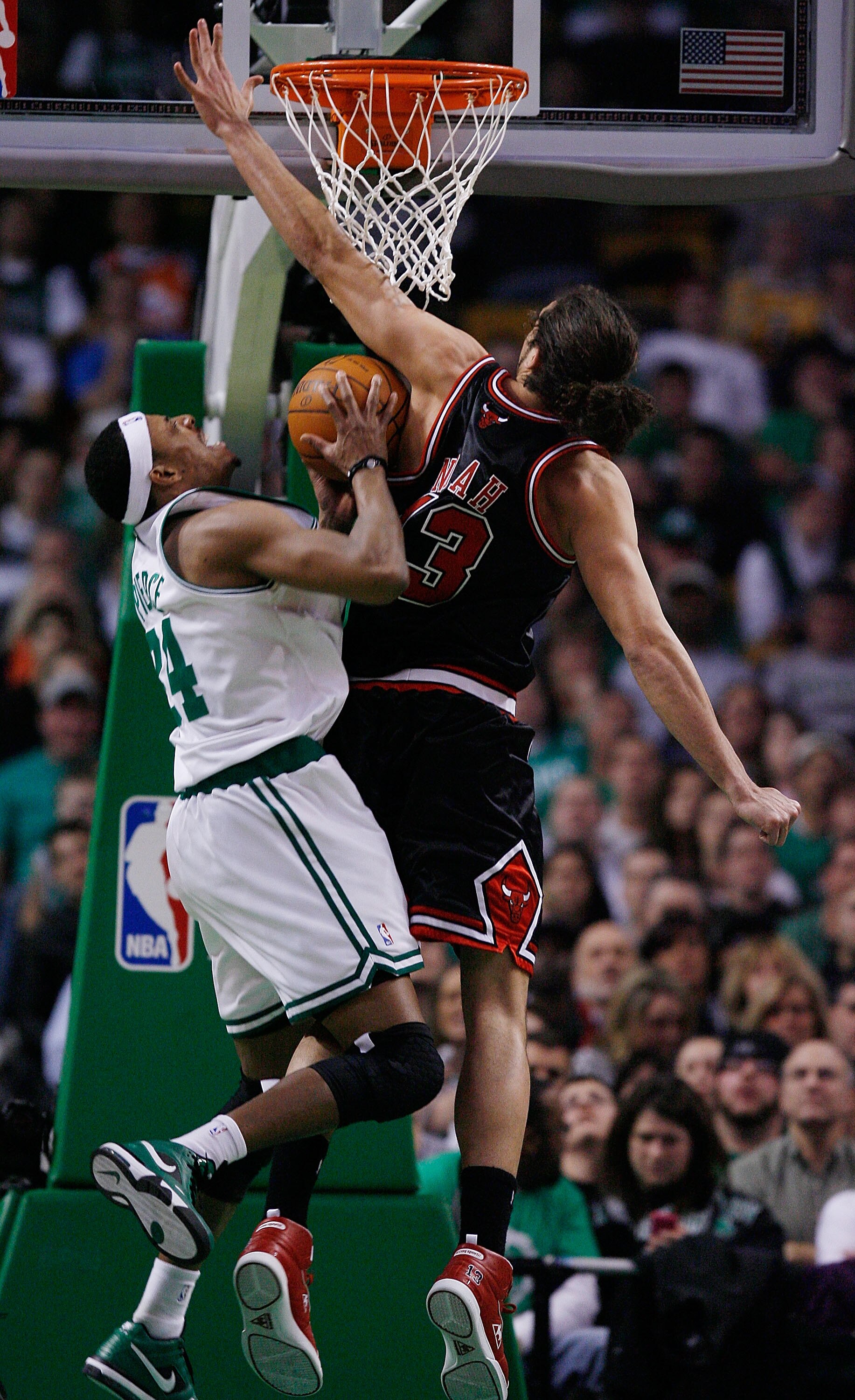BOSTON - JANUARY 14:  Paul Pierce #34 of the Boston Celtics is blocked by Joakim Noah #13 of the Chicago Bulls at the TD Garden on January 14, 2010 in Boston, Massachusetts. The Bulls defeated the Celtics 96-83. NOTE TO USER: User expressly acknowledges a