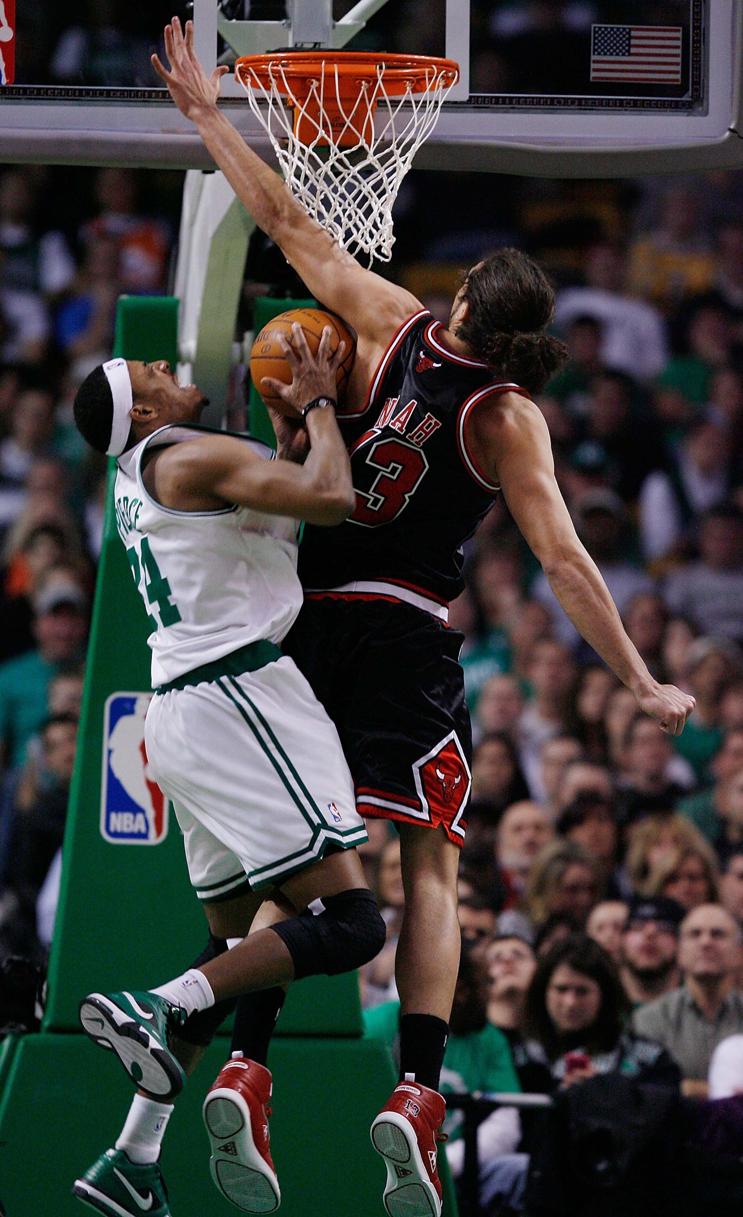 BOSTON - JANUARY 14:  Paul Pierce #34 of the Boston Celtics is blocked by Joakim Noah #13 of the Chicago Bulls at the TD Garden on January 14, 2010 in Boston, Massachusetts. The Bulls defeated the Celtics 96-83. NOTE TO USER: User expressly acknowledges a