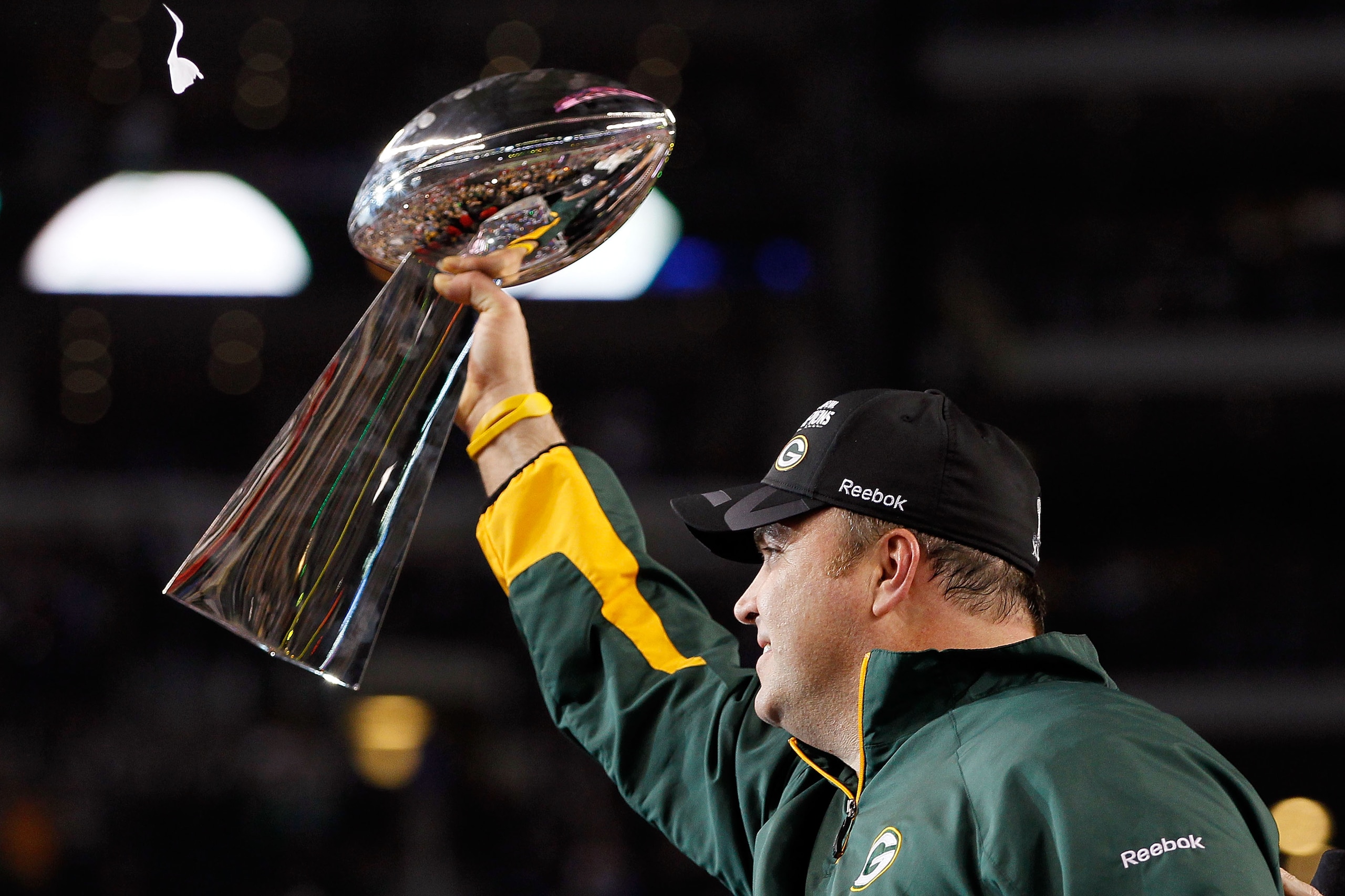 ARLINGTON, TX - FEBRUARY 06:  Head coach Mike McCarthy of the Green Bay Packers holds up the VInce Lombardi trophy after the Packers won 31-25 against the Pittsburgh Steelers during Super Bowl XLV at Cowboys Stadium on February 6, 2011 in Arlington, Texas