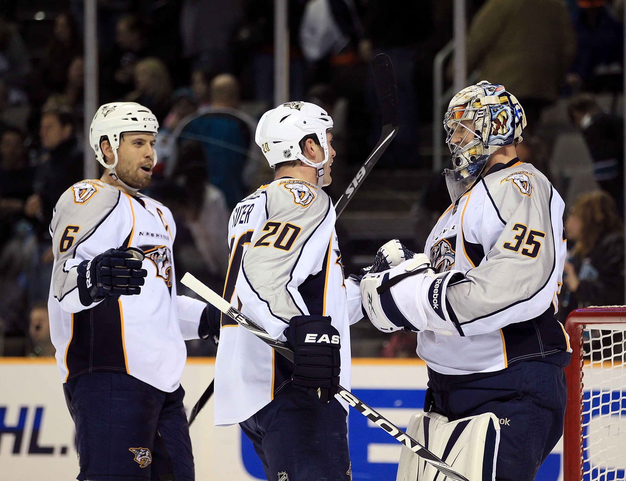 SAN JOSE, CA - JANUARY 08:  Pekka Rinne #35 of the Nashville Predators is congratulated by Ryan Suter #20 and Shea Weber #6 after they beat the San Jose Sharks at HP Pavilion on January 8, 2011 in San Jose, California.  (Photo by Ezra Shaw/Getty Images)