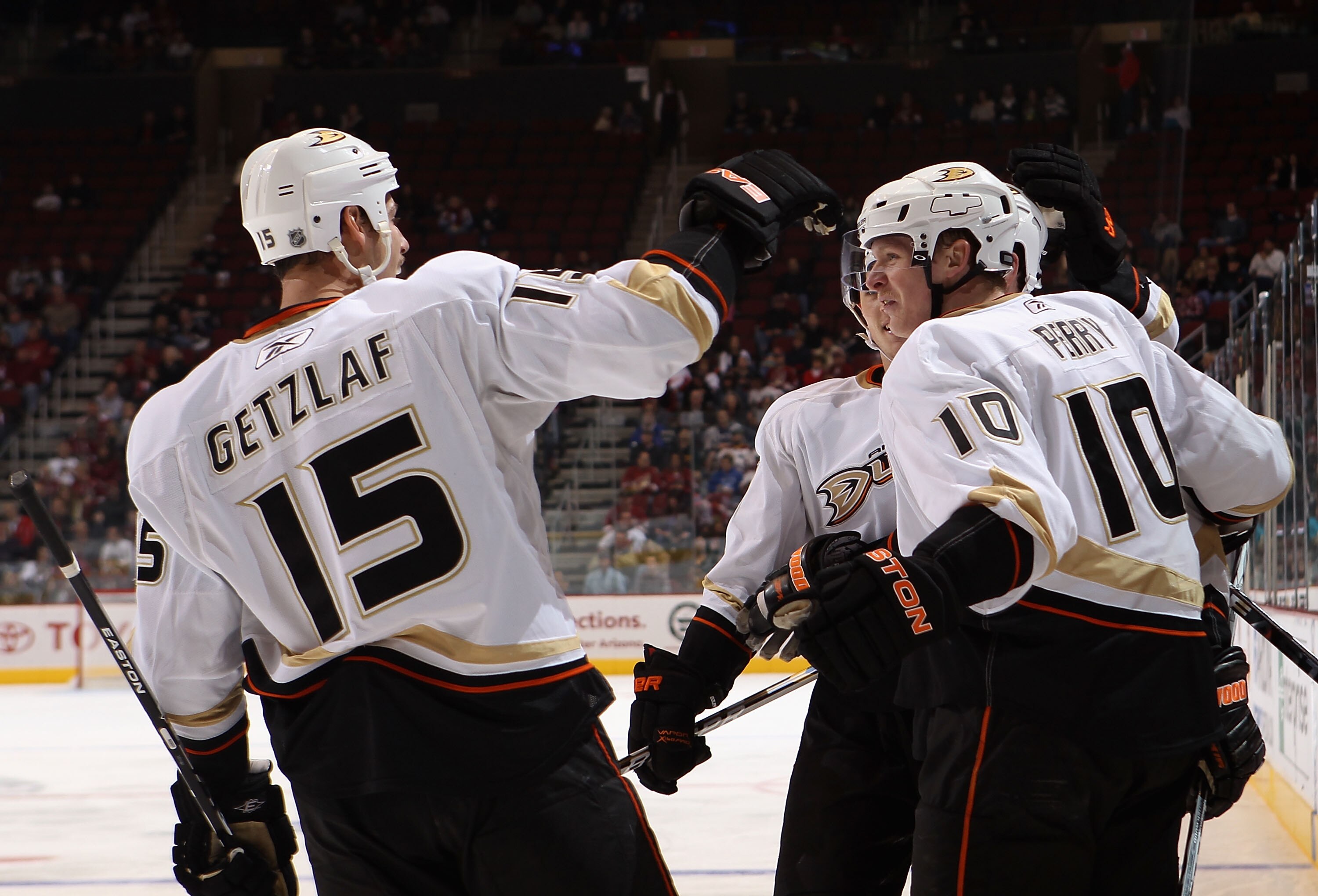 GLENDALE, AZ - NOVEMBER 27:  Corey Perry #10 of the Anaheim Ducks celebrates with Ryan Getzlaf #15 after Perry scored a third period goal against the Phoenix Coyotes during the NHL game at Jobing.com Arena on November 27, 2010 in Glendale, Arizona. The Du