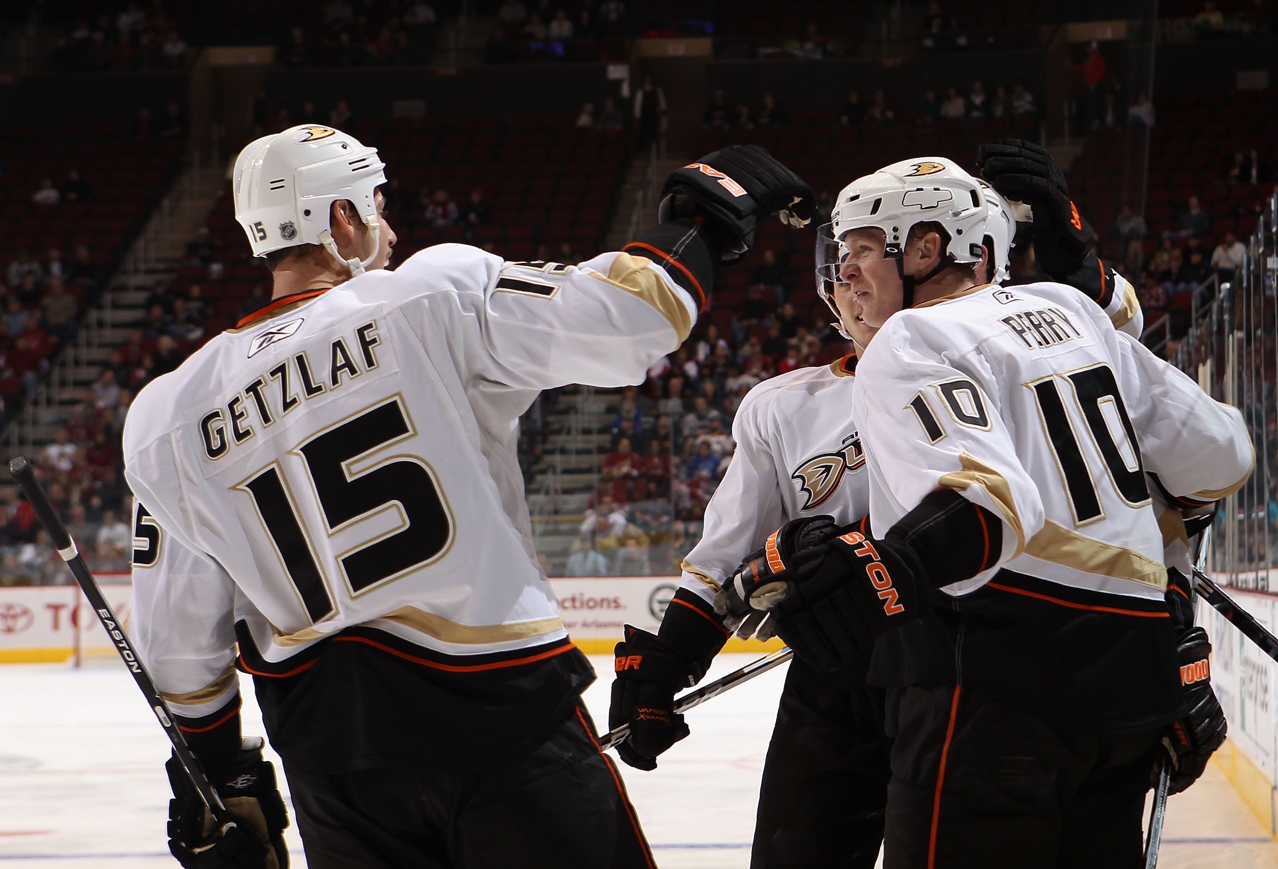 GLENDALE, AZ - NOVEMBER 27:  Corey Perry #10 of the Anaheim Ducks celebrates with Ryan Getzlaf #15 after Perry scored a third period goal against the Phoenix Coyotes during the NHL game at Jobing.com Arena on November 27, 2010 in Glendale, Arizona. The Du