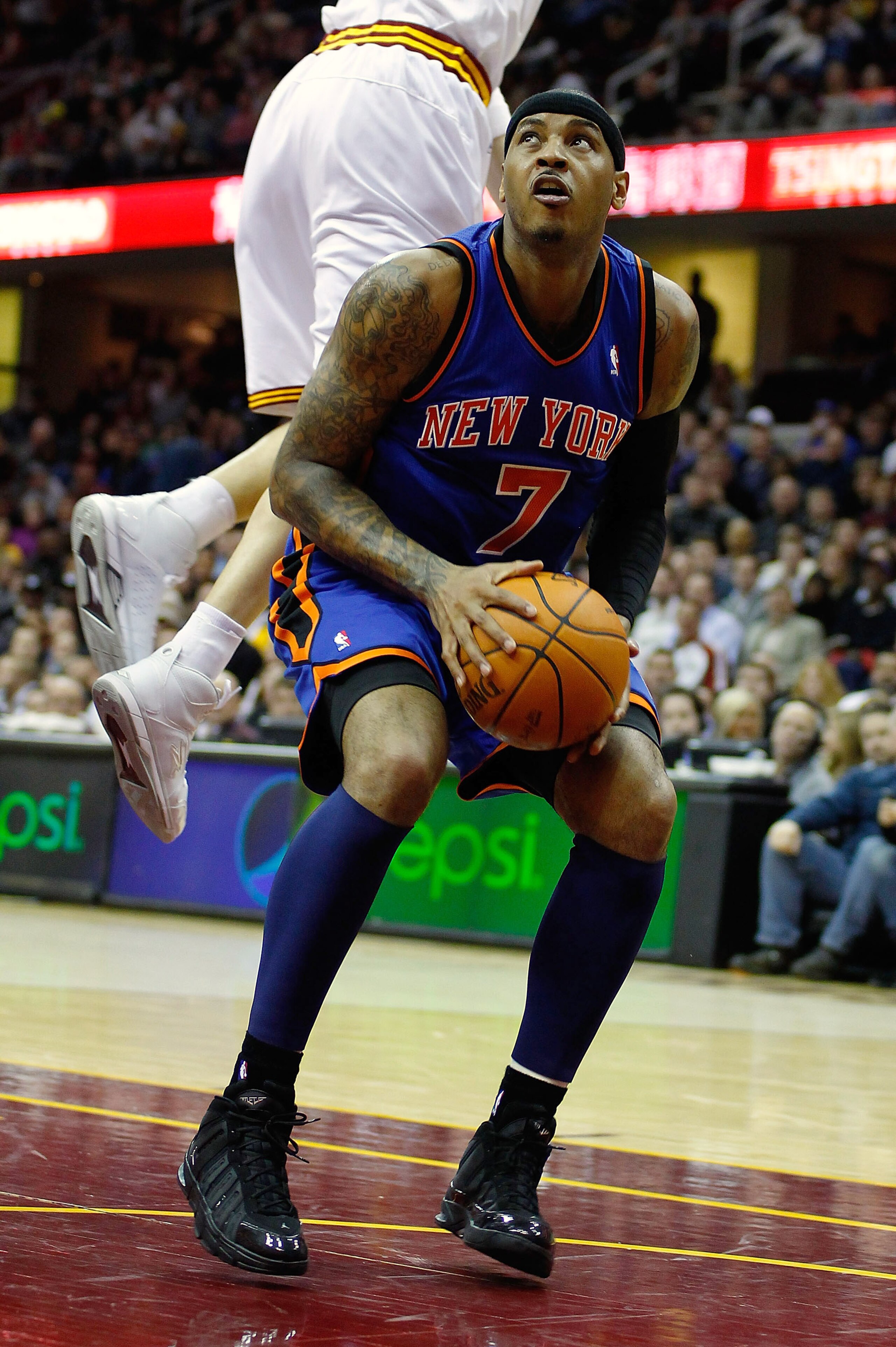 CLEVELAND - FEBRUARY 25:  Carmelo Anthony #7 of the New York Knicks controls the ball against the Cleveland Cavaliers during the game on February 25, 2011 at Quicken Loans Arena in Cleveland, Ohio. NOTE TO USER: User expressly acknowledges and agrees that