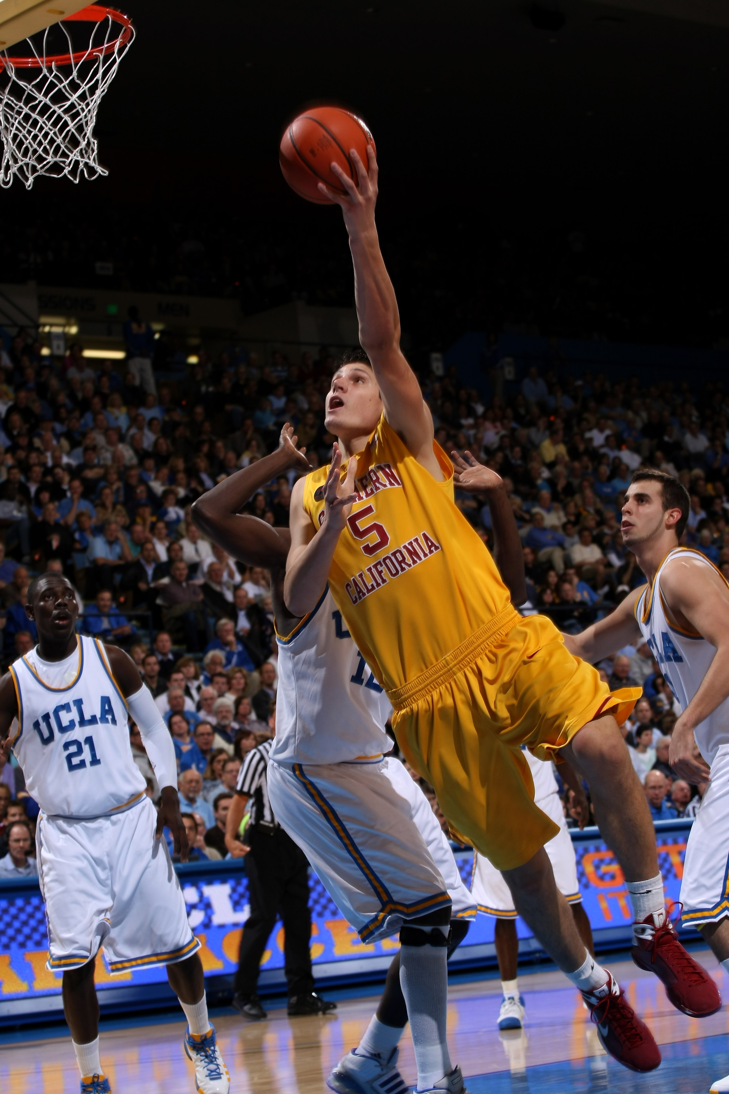 WESTWOOD, CA - FEBRUARY 4:  Nikola Vucevic #5 of the USC Trojans shoots against the UCLA Bruins on February 4, 2009 at Pauley Pavillion in Westwood, California.    (Photo by Stephen Dunn/Getty Images)