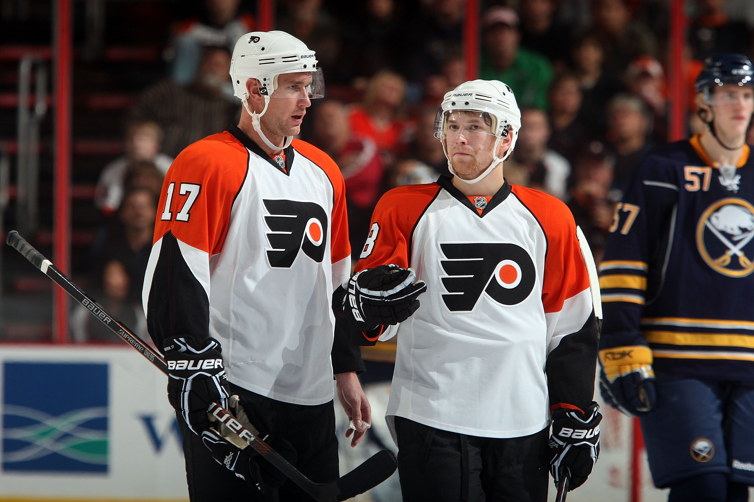 PHILADELPHIA - NOVEMBER 14:  Claude Giroux #28 and Jeff Carter #17 of the Philadelphia Flyers talk during a timeout against the Buffalo Sabres on November 14, 2009 at Wachovia Center in Philadelphia, Pennsylvania.  (Photo by Jim McIsaac/Getty Images)