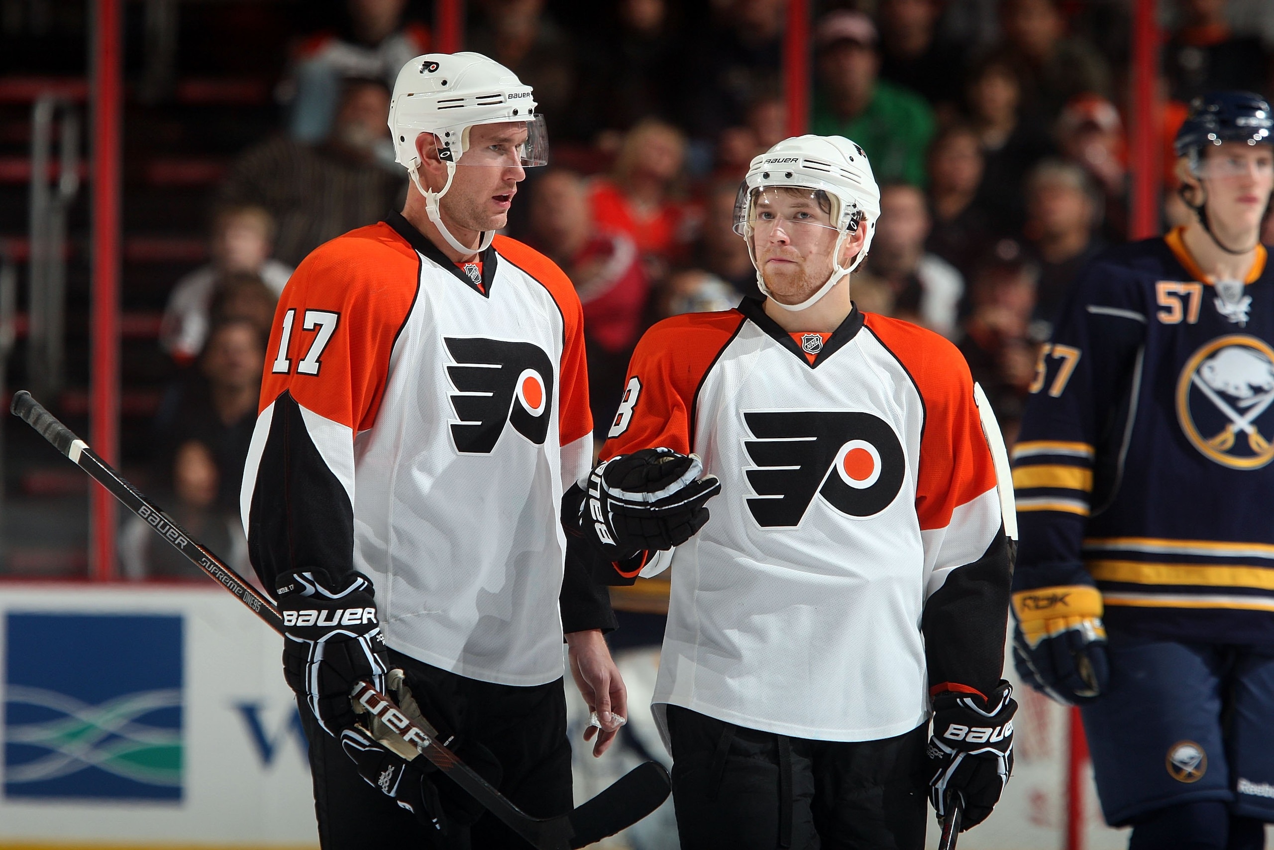 PHILADELPHIA - NOVEMBER 14:  Claude Giroux #28 and Jeff Carter #17 of the Philadelphia Flyers talk during a timeout against the Buffalo Sabres on November 14, 2009 at Wachovia Center in Philadelphia, Pennsylvania.  (Photo by Jim McIsaac/Getty Images)