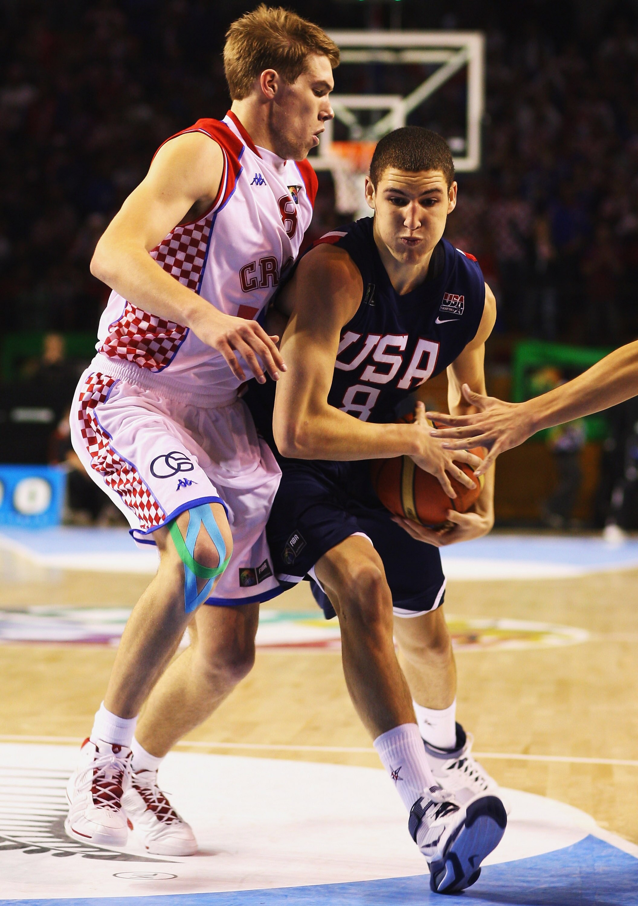 AUCKLAND, NEW ZEALAND - JULY 11: Klay Thompson of the USA is put under pressure from Sime Olivari of Croatia during the U19 Basketball World Championships Semi-Final match between Croatia and the United States of America at North Shore Events Centre on J AUCKLAND, NEW ZEALAND - JULY 11: Klay Thompson of the USA is put under pressure from Sime Olivari of Croatia during the U19 Basketball World Championships Semi-Final match between Croatia and the United States of America at North Shore Events Centre on J