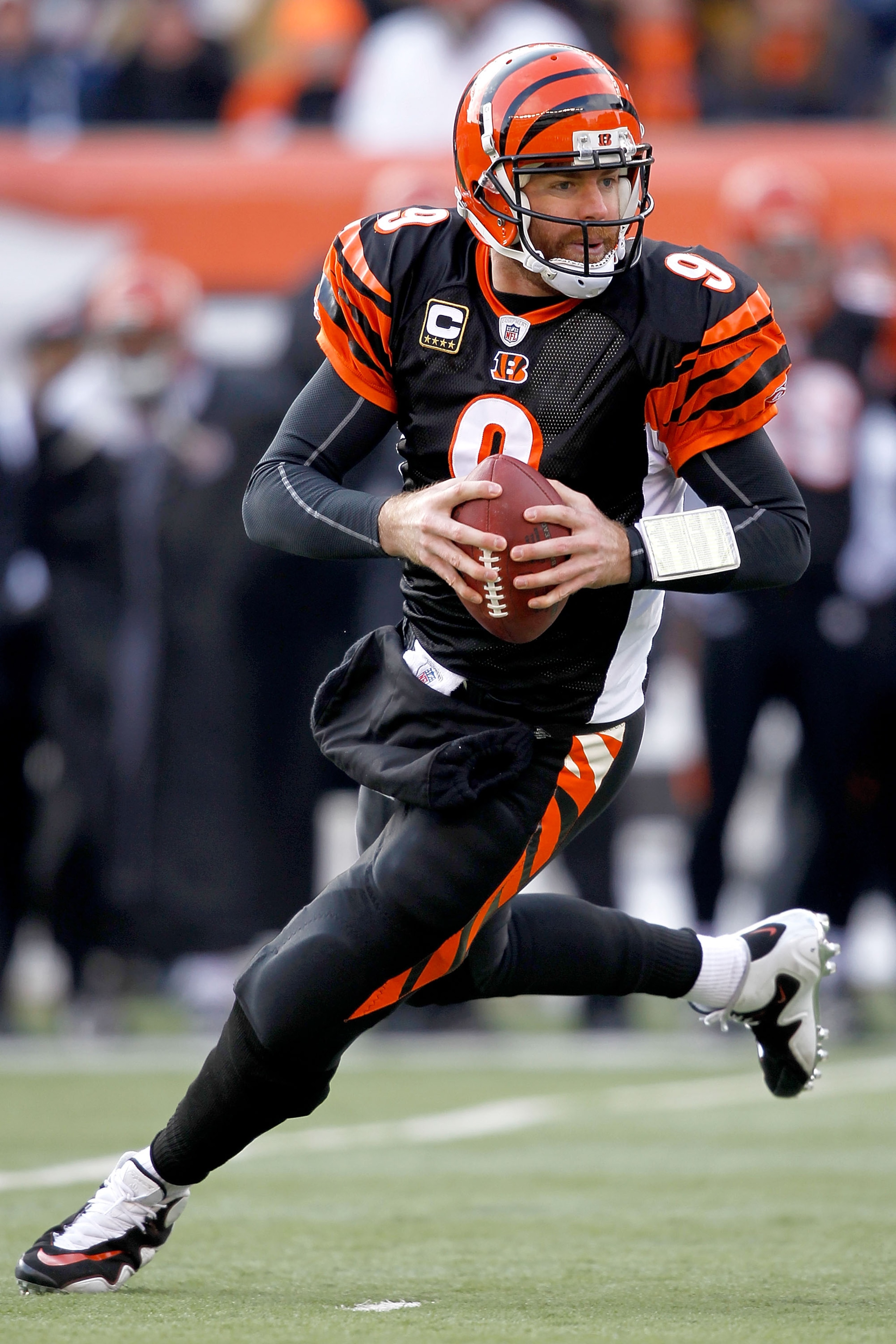 CINCINNATI, OH - DECEMBER 19: Quarterback Carson Palmer #9 of the Cincinnati Bengals rolls out of the pocket while playing the Cleveland Browns at Paul Brown Stadium on December 19, 2010 in Cincinnati, Ohio. (Photo by Matthew Stockman/Getty Images) CINCINNATI, OH - DECEMBER 19: Quarterback Carson Palmer #9 of the Cincinnati Bengals rolls out of the pocket while playing the Cleveland Browns at Paul Brown Stadium on December 19, 2010 in Cincinnati, Ohio. (Photo by Matthew Stockman/Getty Images)