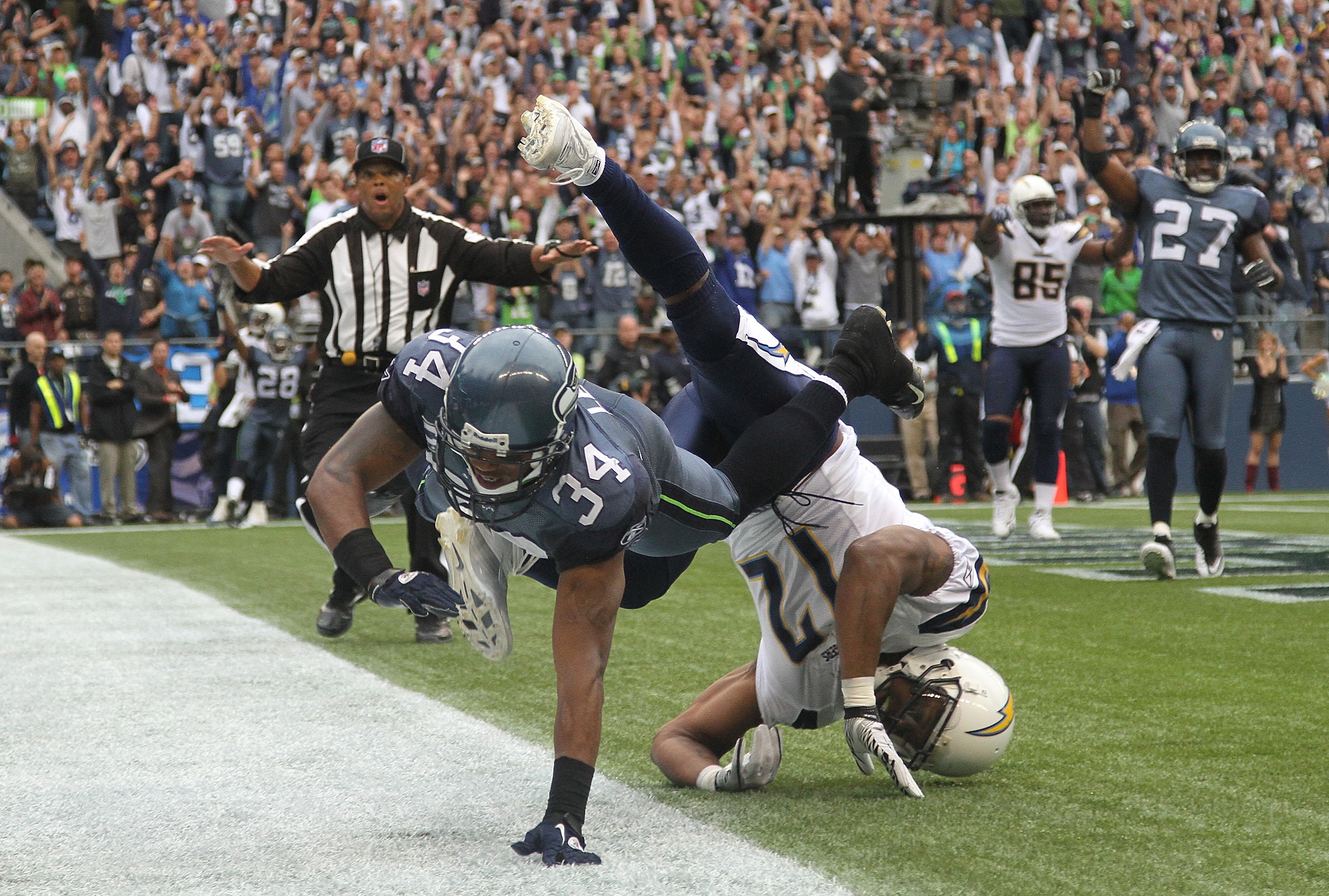 SEATTLE - SEPTEMBER 26:  Cornerback Roy Lewis #34 of the Seattle Seahawks breaks up a fourth down pass to Patrick Crayton #12 of the San Diego Chargers on their final possession at Qwest Field on September 26, 2010 in Seattle, Washington. The Seahawks def