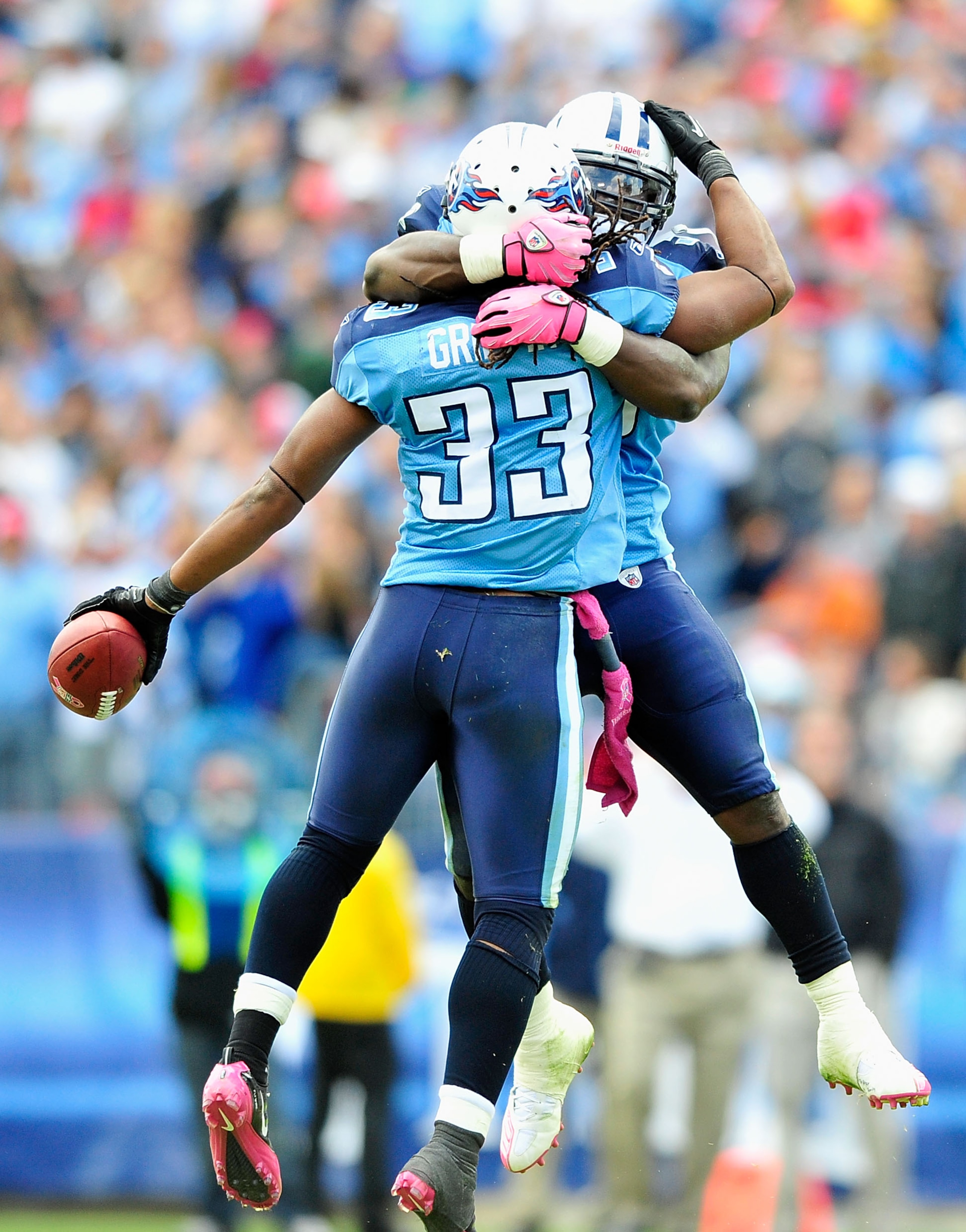 NASHVILLE, TN - OCTOBER 03:  Stephen Tulloch #55 and Michael Griffin #33 of the Tennessee Titans celebrate after Griffin's interception against the Denver Broncos at LP Field on October 3, 2010 in Nashville, Tennessee. Denver won 26-20.  (Photo by Grant H
