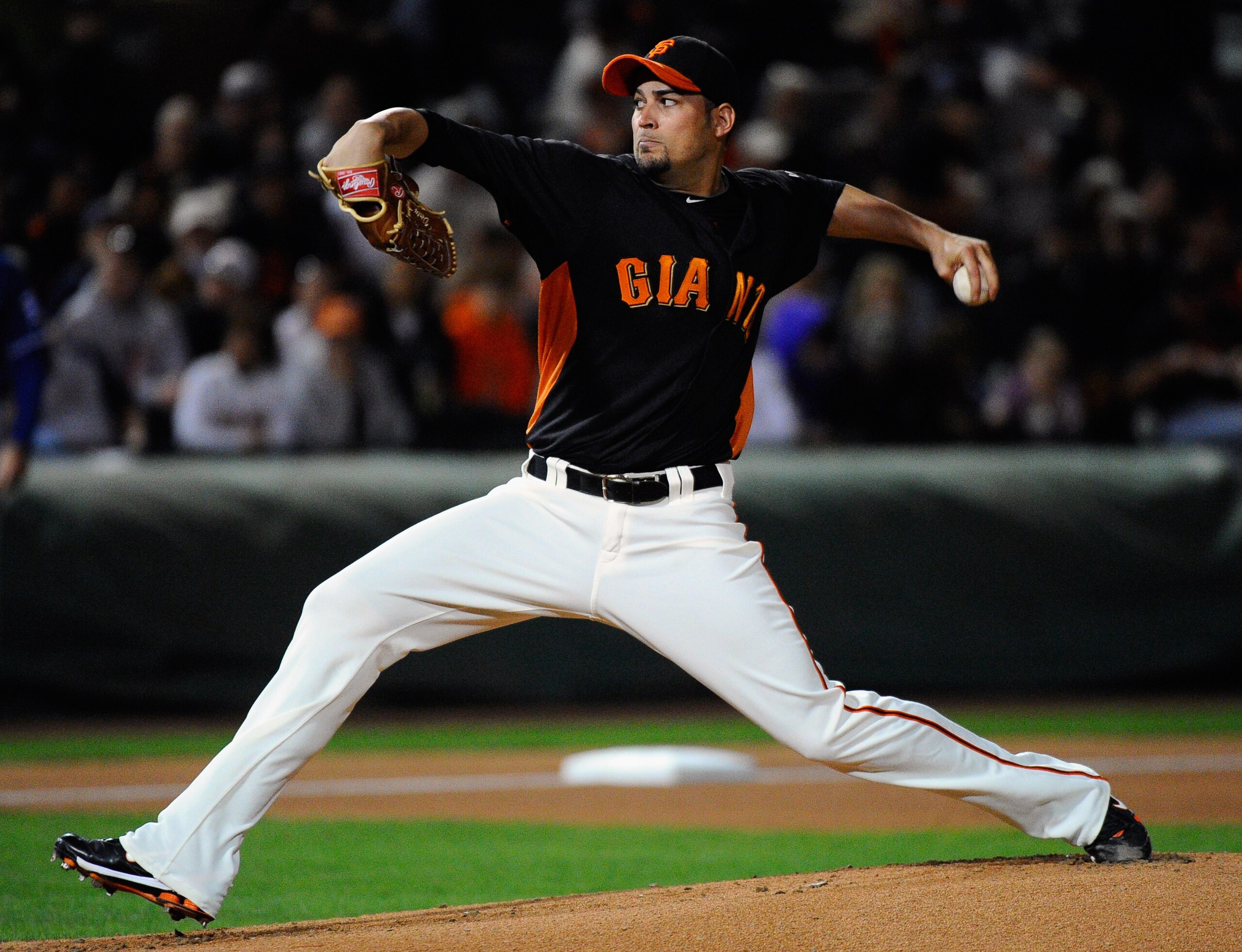 SCOTTSDALE, AZ - MARCH 07: Pitcher Jonathan Sanchez #57 of the San Francisco Giants throws a pitch against the Texas Rangers during the first inning in the first meeting between the two teams since the World Series during the spring training game at Scott SCOTTSDALE, AZ - MARCH 07: Pitcher Jonathan Sanchez #57 of the San Francisco Giants throws a pitch against the Texas Rangers during the first inning in the first meeting between the two teams since the World Series during the spring training game at Scott