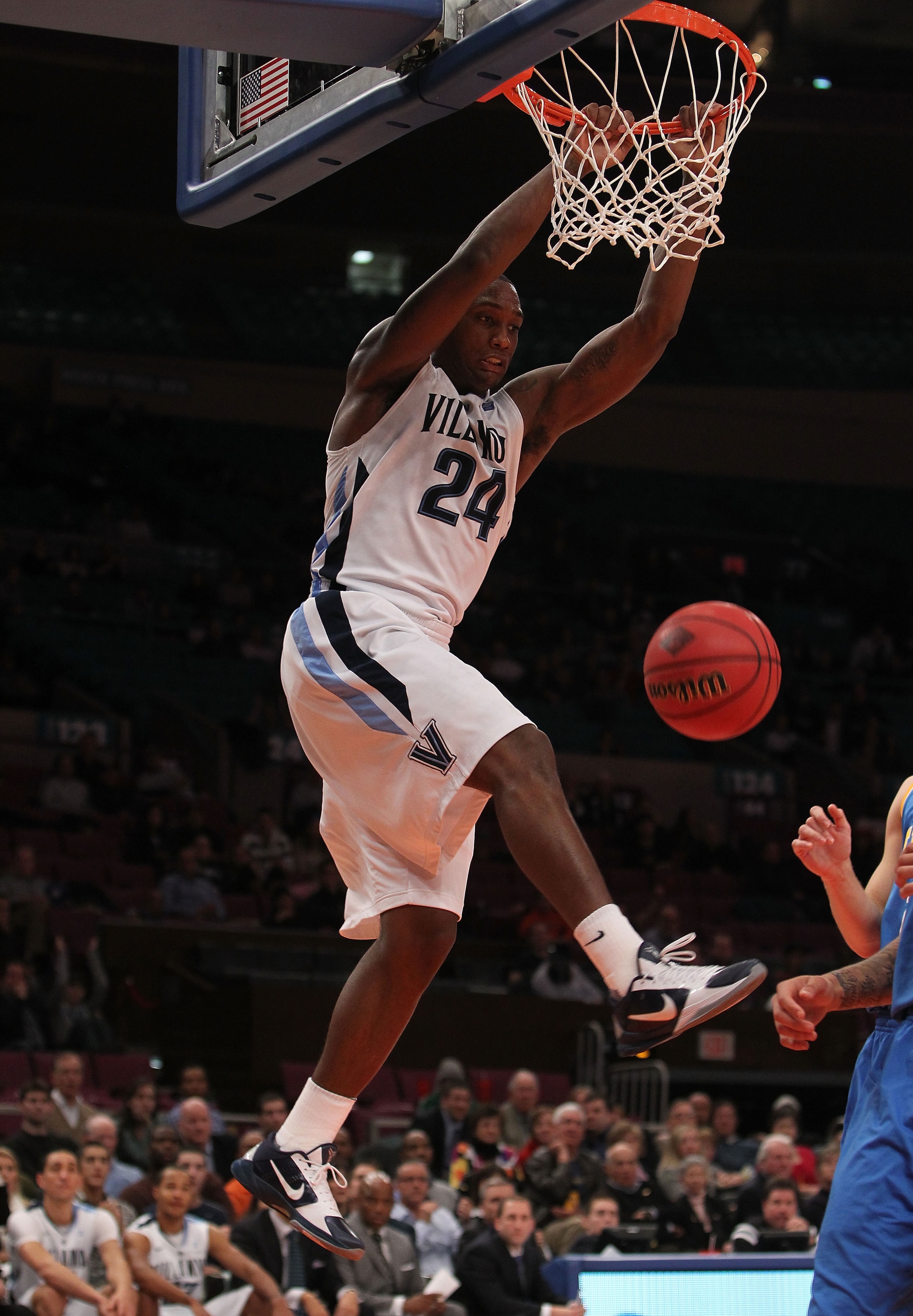 NEW YORK - NOVEMBER 24:  Corey Stokes #24 of the Villanova Wildcats dunks against the UCLA Bruins during their preseason NIT semifinal at Madison Square Garden on November 24, 2010 in New York City.  (Photo by Nick Laham/Getty Images)