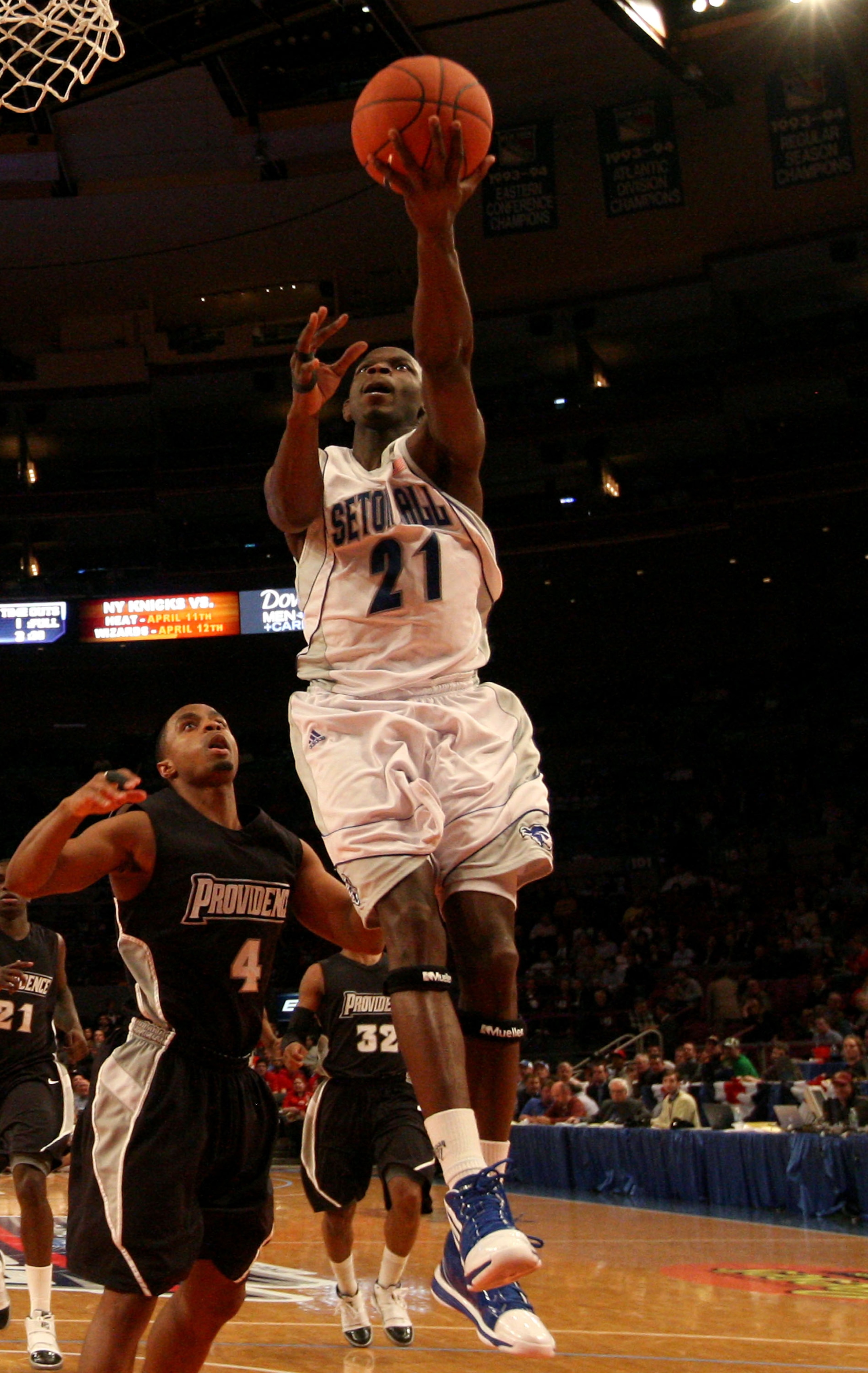 NEW YORK - MARCH 09: Jeremy Hazell #21 of the Seton Hall Pirates drives to the hoop against Sharaud Curry#4 of the Providence Friars during the first round game of the Big East Basketball Tournament at Madison Square Garden on March 9, 2010 in New York, N