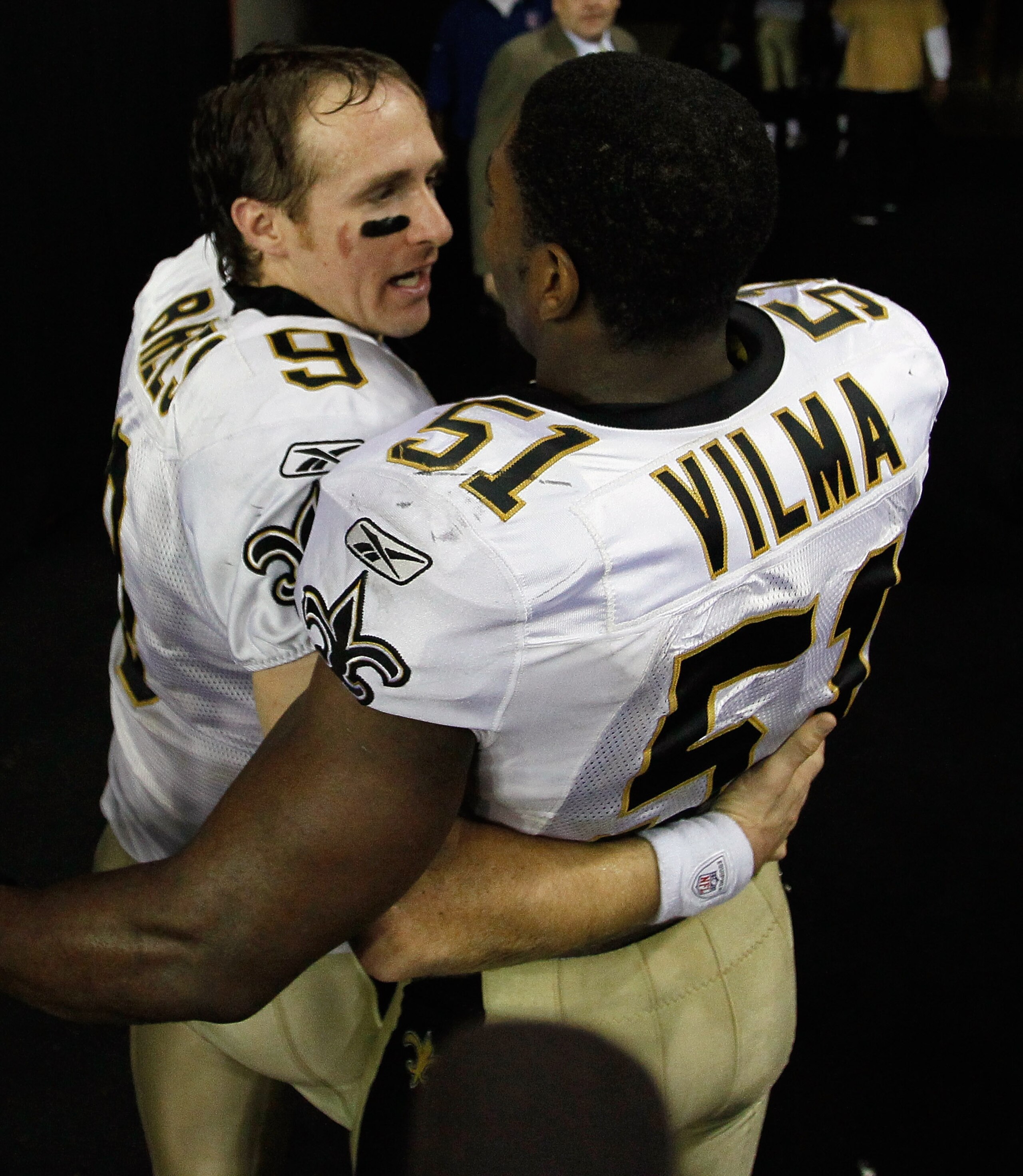 ATLANTA, GA - DECEMBER 27:  Quarterback Drew Brees #9 of the New Orleans Saints celebrates with Jonathan Vilma #51 after defeating the Atlanta Falcons 17-14 at the Georgia Dome on December 27, 2010 in Atlanta, Georgia.  (Photo by Kevin C. Cox/Getty Images