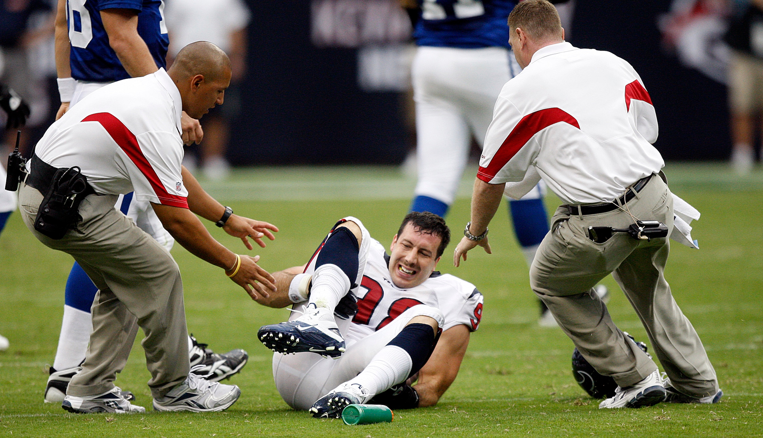 HOUSTON - SEPTEMBER 12:  Defensive end Connor Barwin #98 of the Houston Texans goes down with an injury in the first quarter against the Indianapolis Colts at Reliant Stadium on September 12, 2010 in Houston, Texas.  (Photo by Bob Levey/Getty Images)