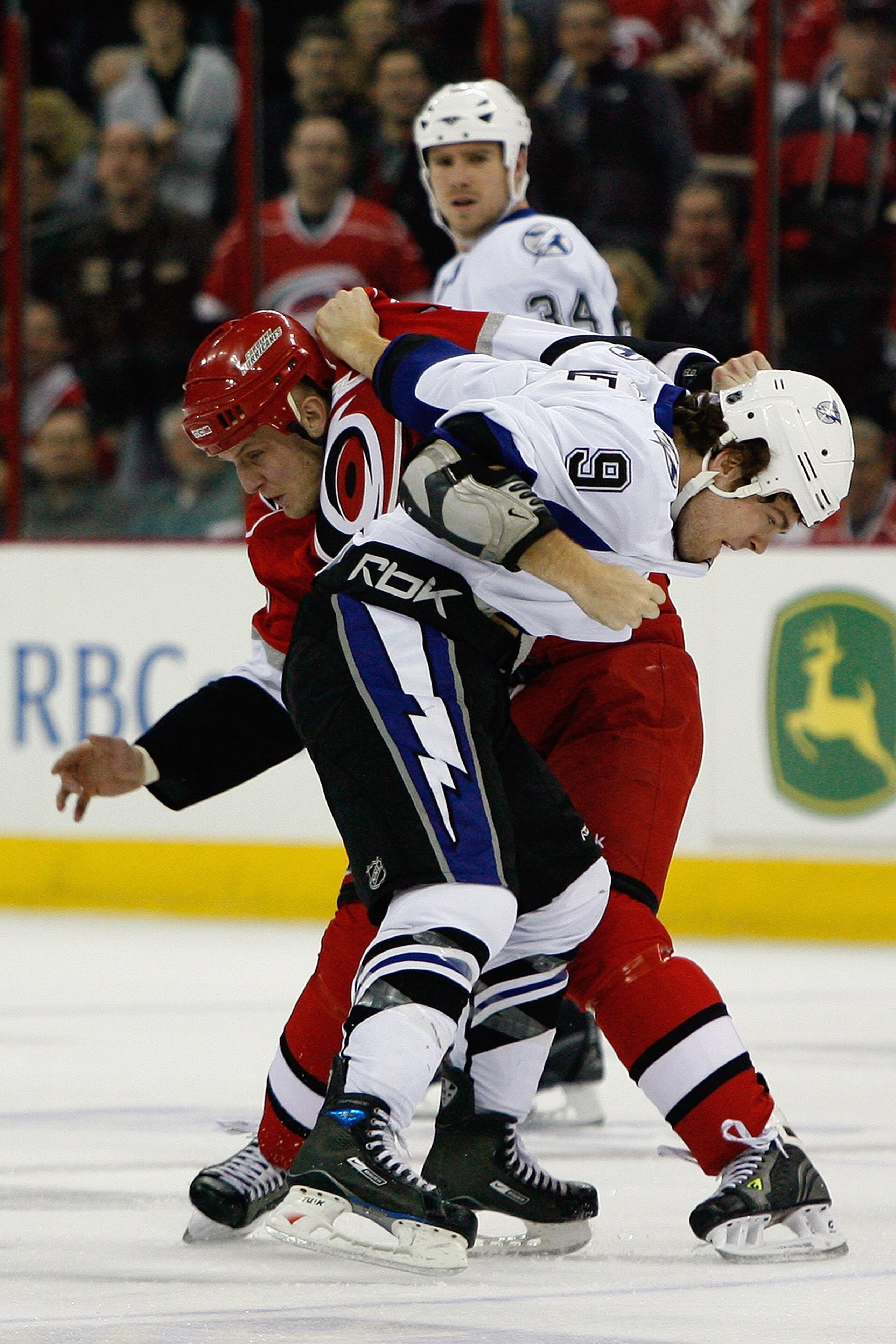 RALEIGH, NC - FEBRUARY 20: Tim Conboy #38 of the Carolina Hurricanes fights Steve Downie #9 of the Tampa Bay Lightning during the game on February 20, 2009 at RBC Center in Raleigh, North Carolina. (Photo by Kevin C. Cox/Getty Images) RALEIGH, NC - FEBRUARY 20: Tim Conboy #38 of the Carolina Hurricanes fights Steve Downie #9 of the Tampa Bay Lightning during the game on February 20, 2009 at RBC Center in Raleigh, North Carolina. (Photo by Kevin C. Cox/Getty Images)
