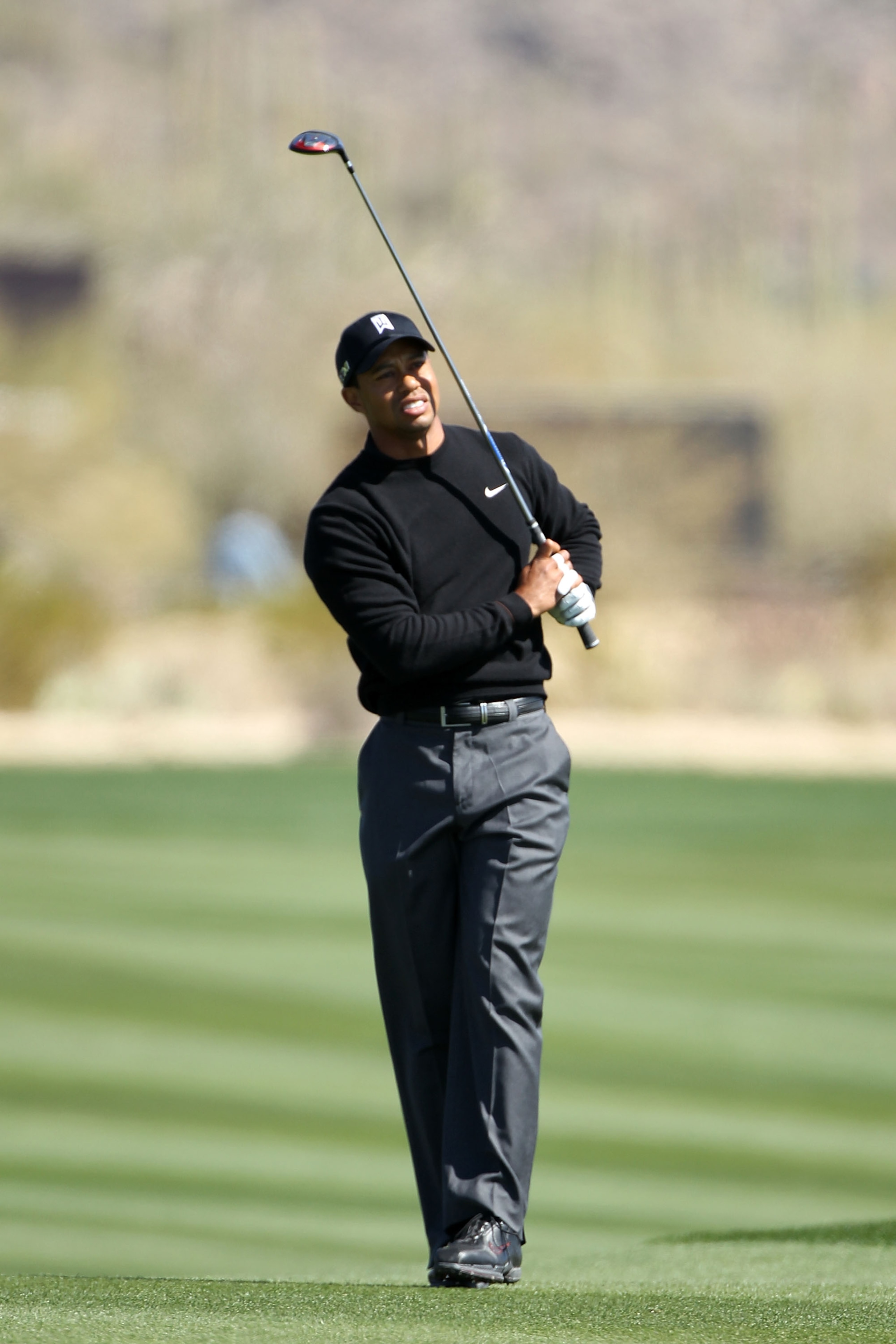 MARANA, AZ - FEBRUARY 23:  Tiger Woods watches his shot during the first round of the Accenture Match Play Championship at the Ritz-Carlton Golf Club on February 23, 2011 in Marana, Arizona.  (Photo by Andy Lyons/Getty Images)