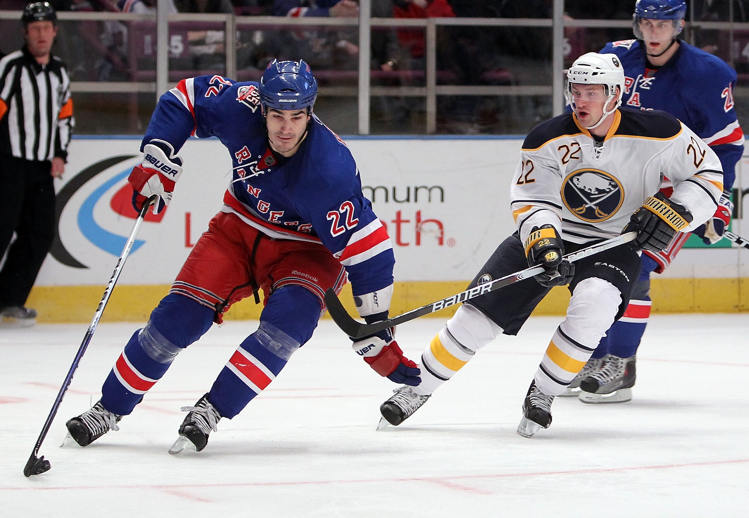 NEW YORK, NY - MARCH 01: Brian Boyle #22 of the New York Rangers skates with the puck under pressure from Brad Boyes #22 of the Buffalo Sabres at Madison Square Garden on March 1, 2011 in New York City. (Photo by Nick Laham/Getty Images) NEW YORK, NY - MARCH 01: Brian Boyle #22 of the New York Rangers skates with the puck under pressure from Brad Boyes #22 of the Buffalo Sabres at Madison Square Garden on March 1, 2011 in New York City. (Photo by Nick Laham/Getty Images)