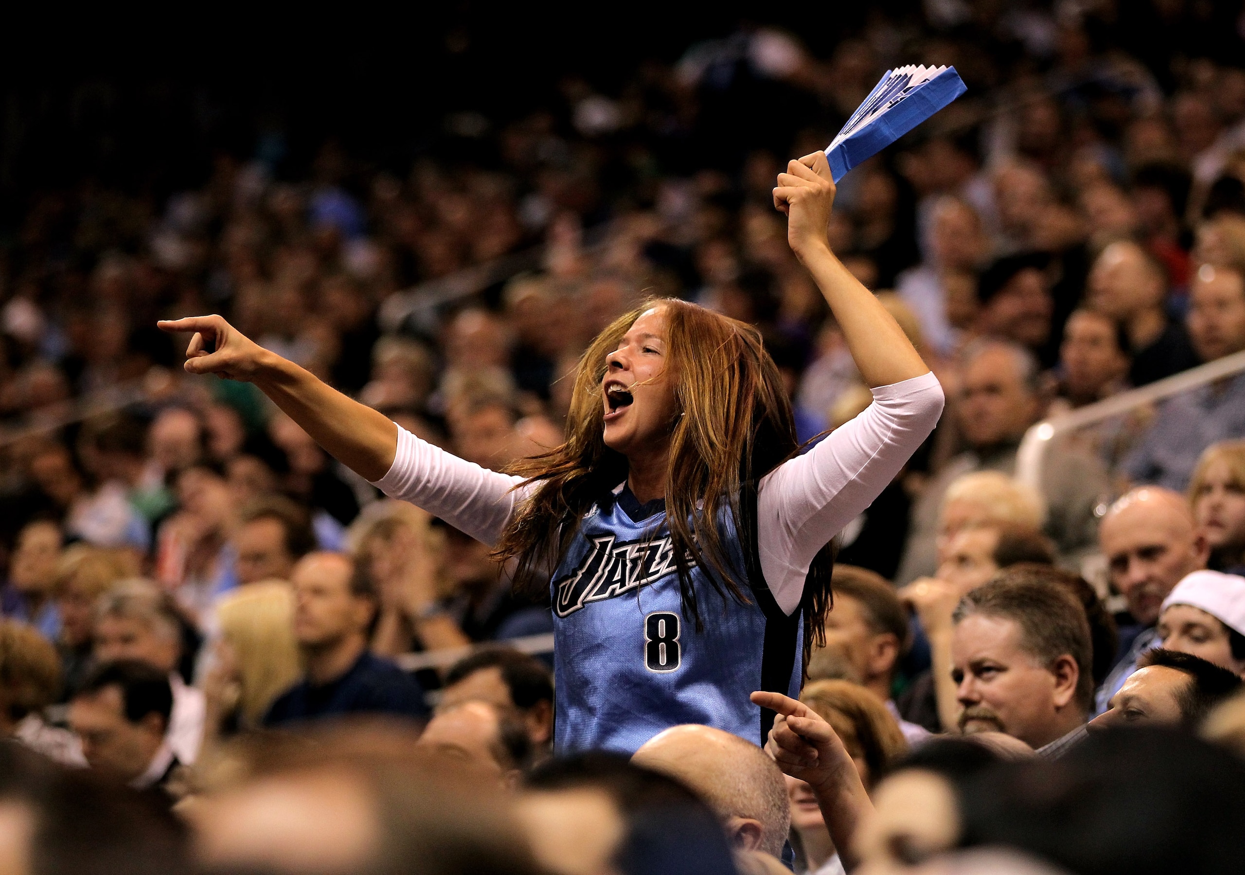 SALT LAKE CITY - APRIL 30:  A Utah Jazz fan cheers for her team during their game against the Denver Nuggets in Game Six of the Western Conference Quarterfinals of the 2010 NBA Playoffs at EnergySolutions Arena on April 30, 2010 in Salt Lake City, Utah. N