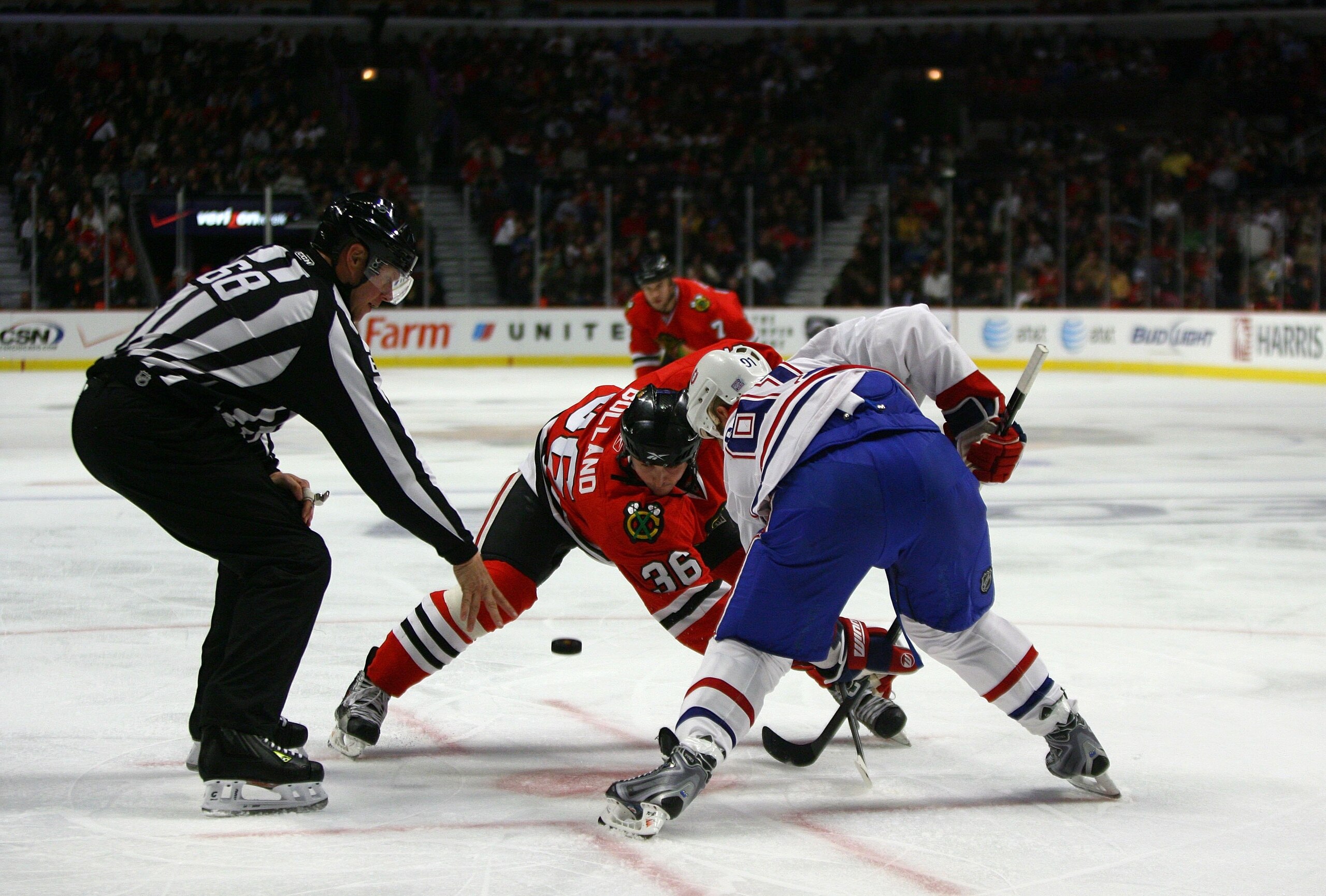 CHICAGO - OCTOBER 30: Dave Bolland #36 of the Chicago Blackhawks takes the offensive zone faceoff against Scott Gomez #91 of the Montreal Canadiens during their game at the United Center on October 30, 2009 in Chicago, Illinois. The Blackhawks defeated t CHICAGO - OCTOBER 30: Dave Bolland #36 of the Chicago Blackhawks takes the offensive zone faceoff against Scott Gomez #91 of the Montreal Canadiens during their game at the United Center on October 30, 2009 in Chicago, Illinois. The Blackhawks defeated t