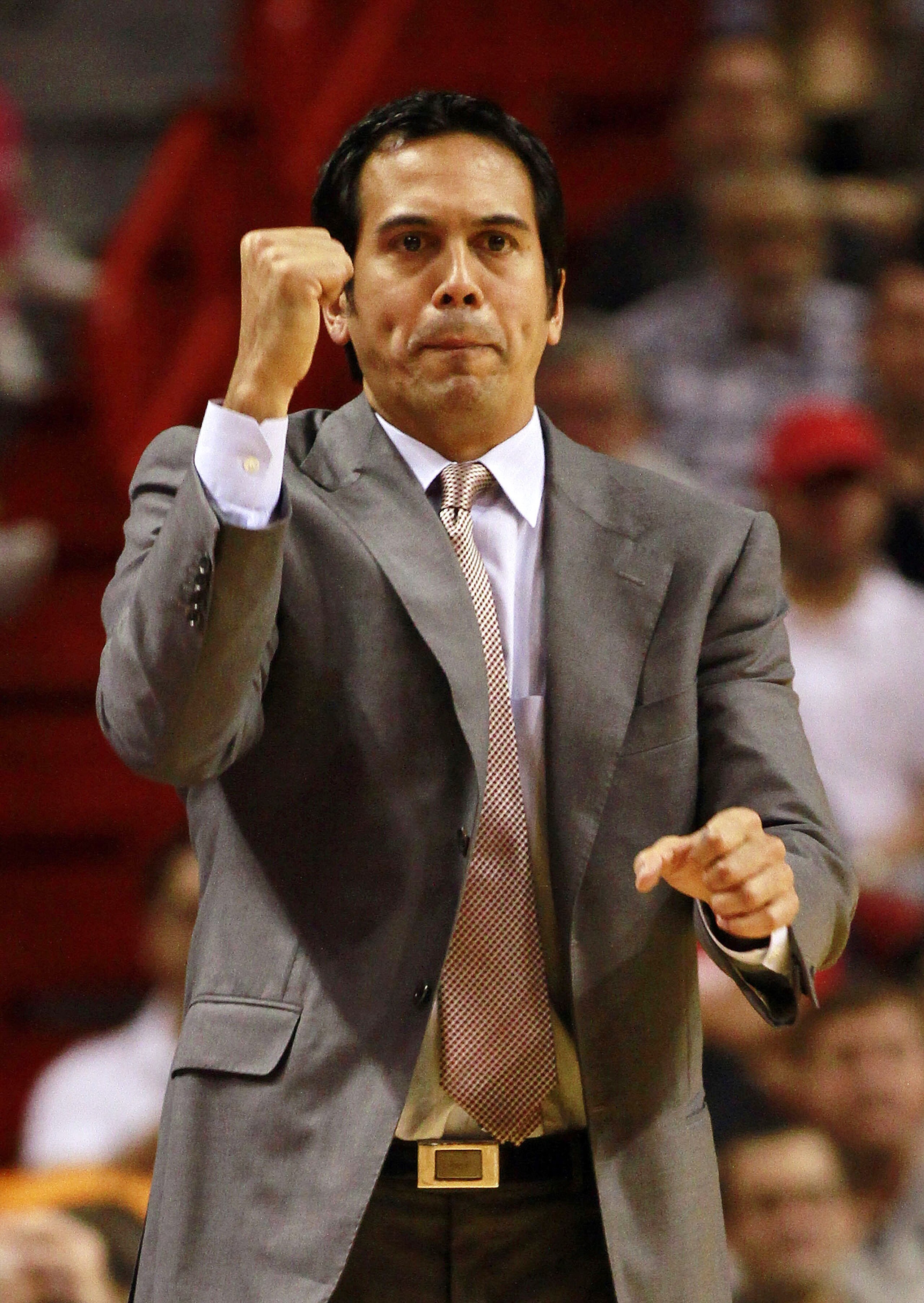 MIAMI - FEBRUARY 06:  Coach Erik Spoelstra of the Miami Heat reacts against the L.A. Clippers at American Airlines Arena on February 6, 2011 in Miami, Florida. The Heat defeated the Clippers 97-79. NOTE TO USER: User expressly acknowledges and agrees that