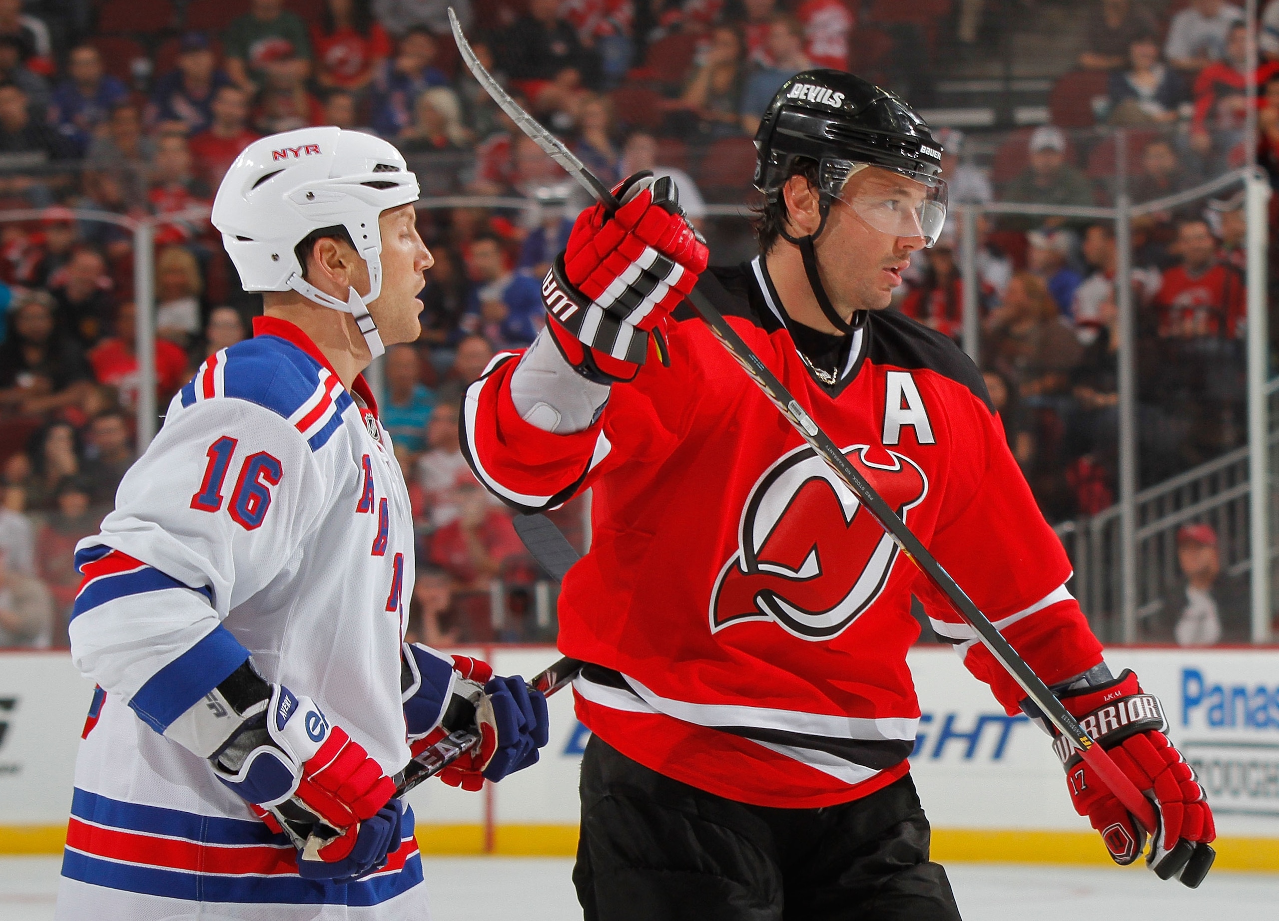 NEWARK, NJ - SEPTEMBER 25: Sean Avery #16 of the New York Rangers covers Ilya Kovalchuk #17 of the New Jersey Devils during a preseason hockey game at the Prudential Center on September 25, 2010 in Newark, New Jersey. (Photo by Paul Bereswill/Getty Imag NEWARK, NJ - SEPTEMBER 25: Sean Avery #16 of the New York Rangers covers Ilya Kovalchuk #17 of the New Jersey Devils during a preseason hockey game at the Prudential Center on September 25, 2010 in Newark, New Jersey. (Photo by Paul Bereswill/Getty Imag