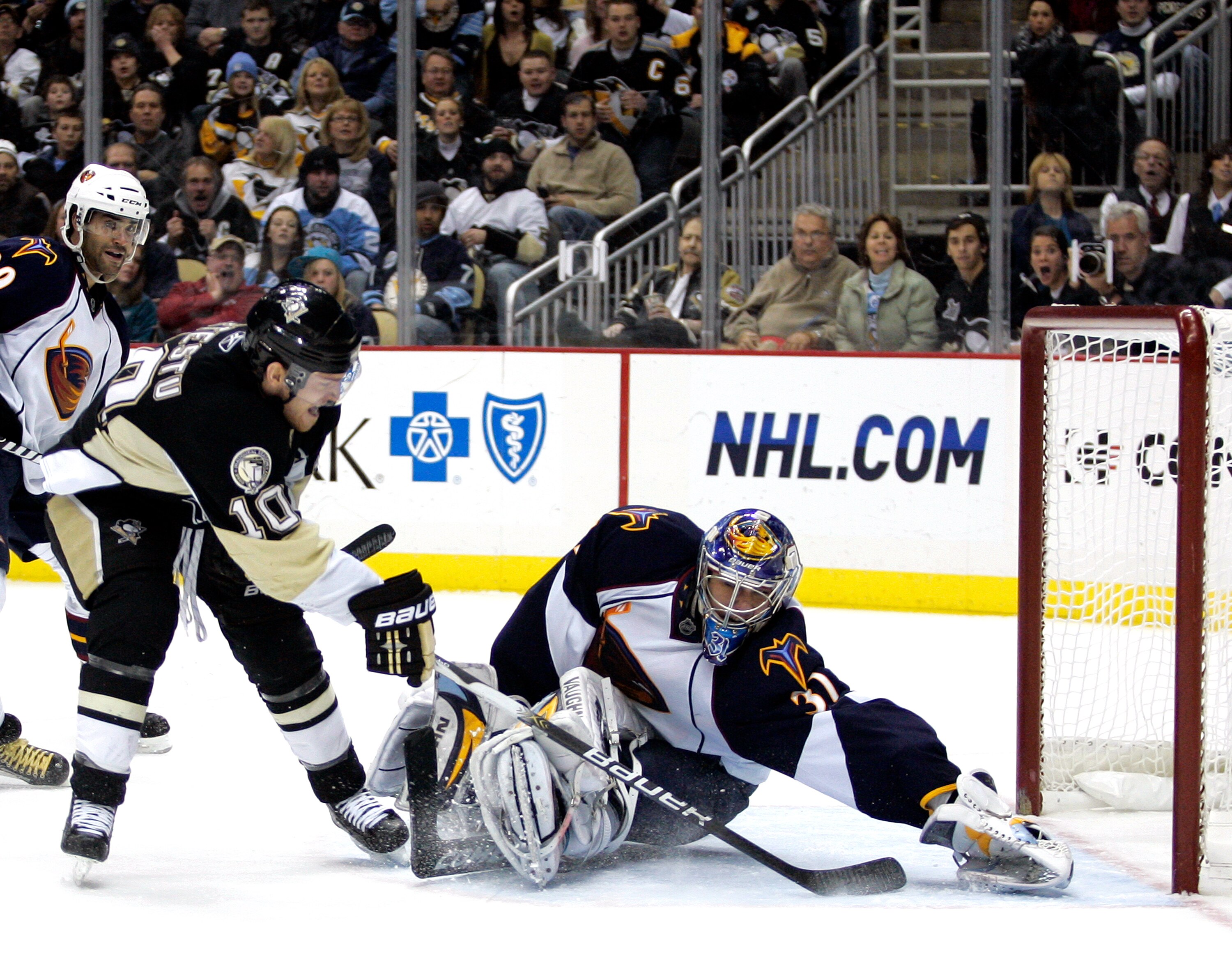 PITTSBURGH, PA - DECEMBER 28:  Mark Letestu #10 of the Pittsburgh Penguins scores past Ondrej Pavelec #31 of the Atlanta Thrashers at Consol Energy Center on December 28, 2010 in Pittsburgh, Pennsylvania.  The Penguins defeated the Thrashers 6-3.  (Photo