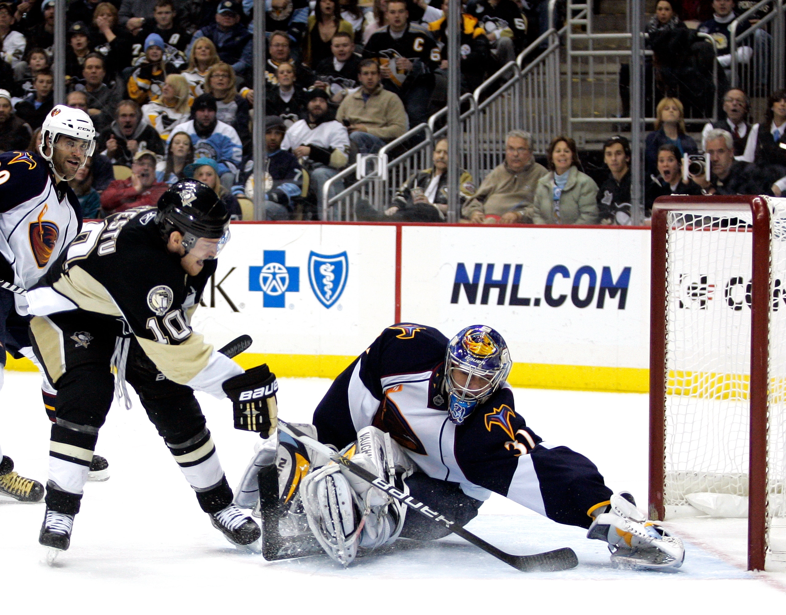 PITTSBURGH, PA - DECEMBER 28: Mark Letestu #10 of the Pittsburgh Penguins scores past Ondrej Pavelec #31 of the Atlanta Thrashers at Consol Energy Center on December 28, 2010 in Pittsburgh, Pennsylvania. The Penguins defeated the Thrashers 6-3. (Photo PITTSBURGH, PA - DECEMBER 28: Mark Letestu #10 of the Pittsburgh Penguins scores past Ondrej Pavelec #31 of the Atlanta Thrashers at Consol Energy Center on December 28, 2010 in Pittsburgh, Pennsylvania. The Penguins defeated the Thrashers 6-3. (Photo