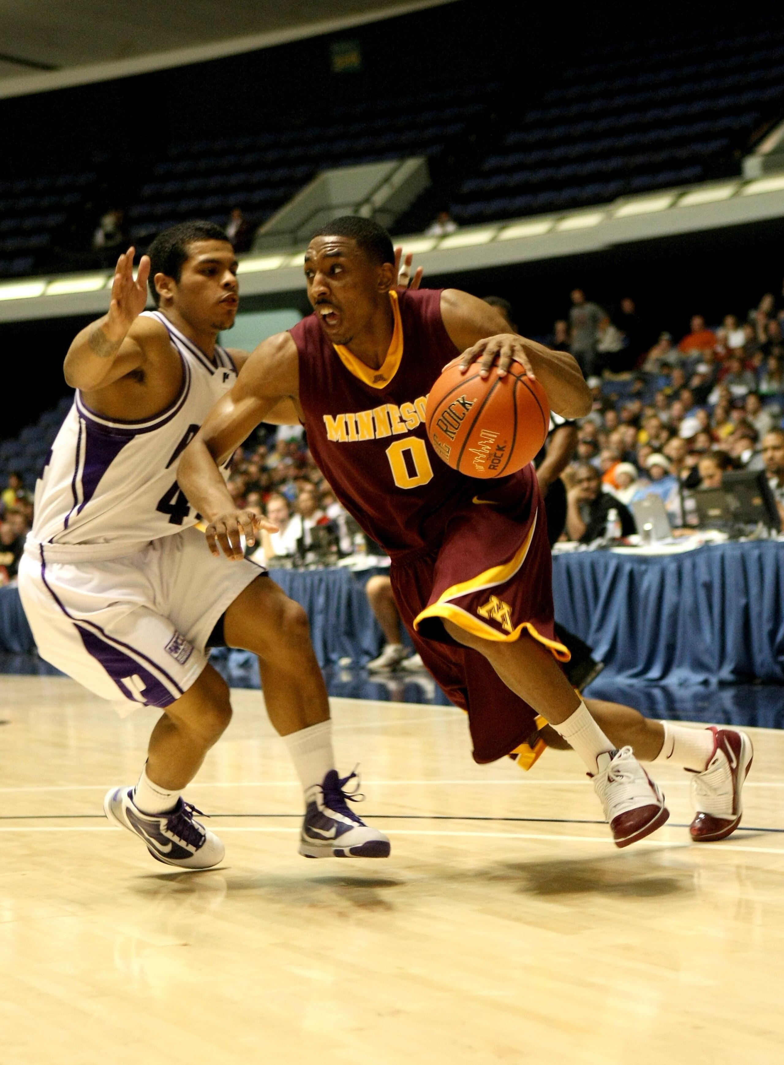 ANAHEIM, CA - NOVEMBER 27: Al Nolen #0 of the Minnesota Gophers drives against T.J. Campbell #44 of the Portland Pilots at the 76 Classic at Anaheim Convention Center on November 27, 2009 in Anaheim, California. (Photo by Stephen Dunn/Getty Images) ANAHEIM, CA - NOVEMBER 27: Al Nolen #0 of the Minnesota Gophers drives against T.J. Campbell #44 of the Portland Pilots at the 76 Classic at Anaheim Convention Center on November 27, 2009 in Anaheim, California. (Photo by Stephen Dunn/Getty Images)