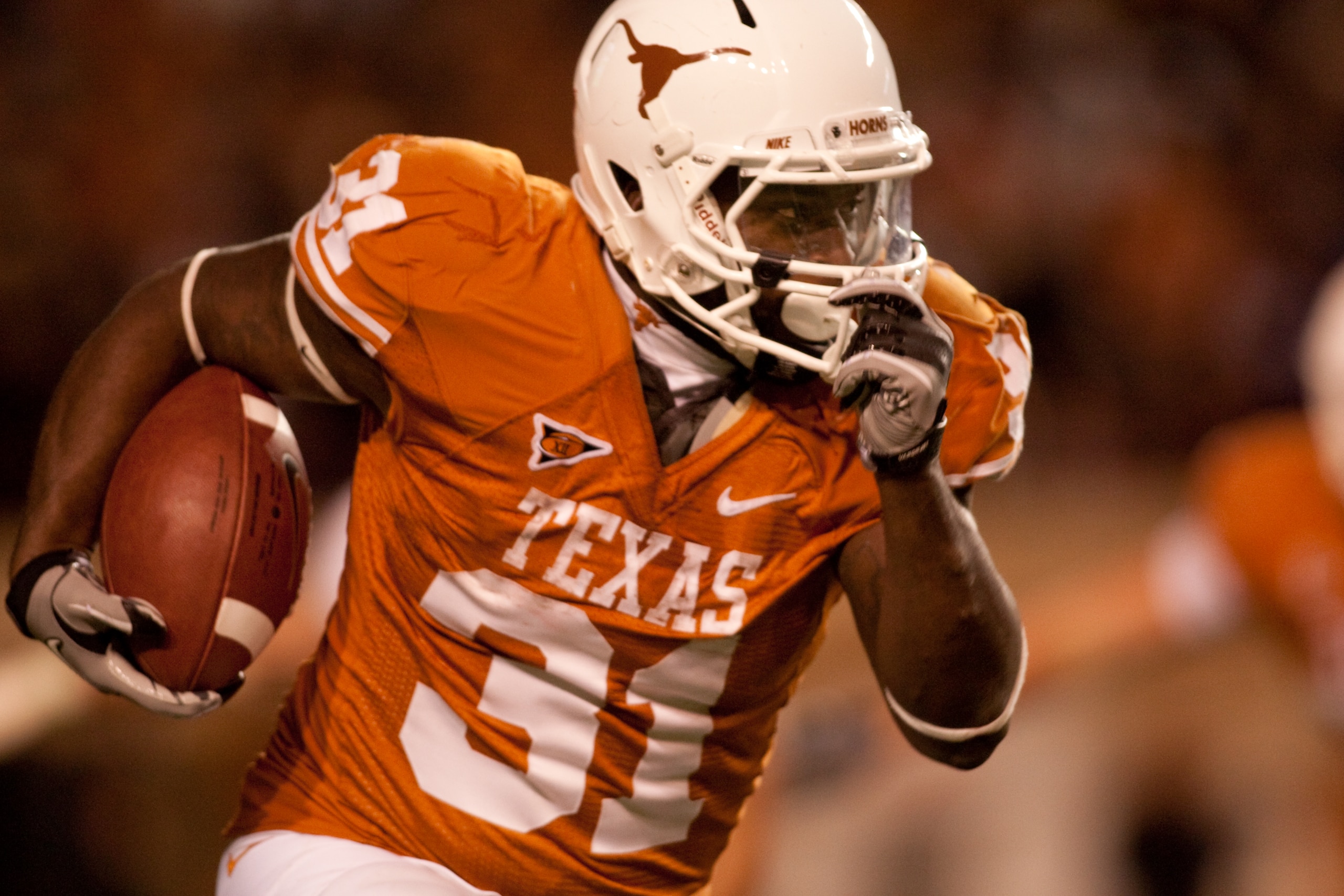 AUSTIN, TX - NOVEMBER 25: Running back Cody Johnson #31 of the University of Texas rushes during the second half against Texas A&M at Darrell K. Royal-Texas Memorial Stadium on November 25, 2010 in Austin, Texas. (Photo by Darren Carroll/Getty Images) AUSTIN, TX - NOVEMBER 25: Running back Cody Johnson #31 of the University of Texas rushes during the second half against Texas A&M at Darrell K. Royal-Texas Memorial Stadium on November 25, 2010 in Austin, Texas. (Photo by Darren Carroll/Getty Images)