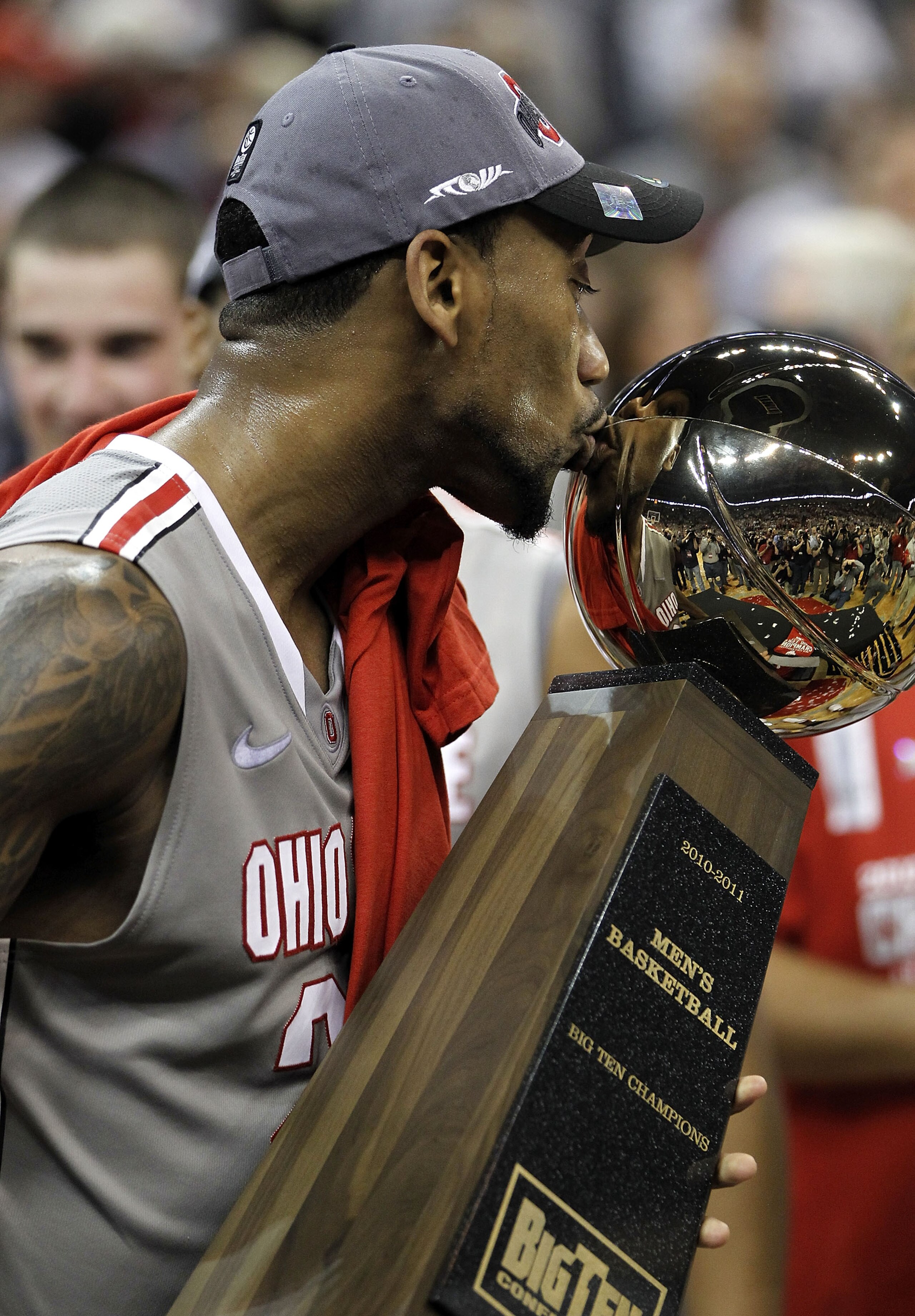 COLUMBUS, OH - MARCH 06: David Lighty #23 of the Ohio State Buckeyes kisses the Big Ten trophy after beating the Wisconsin Badgers 93-65 on March 6, 2011 at the Value City Arena in Columbus, Ohio. (Photo by Gregory Shamus/Getty Images) COLUMBUS, OH - MARCH 06: David Lighty #23 of the Ohio State Buckeyes kisses the Big Ten trophy after beating the Wisconsin Badgers 93-65 on March 6, 2011 at the Value City Arena in Columbus, Ohio. (Photo by Gregory Shamus/Getty Images)