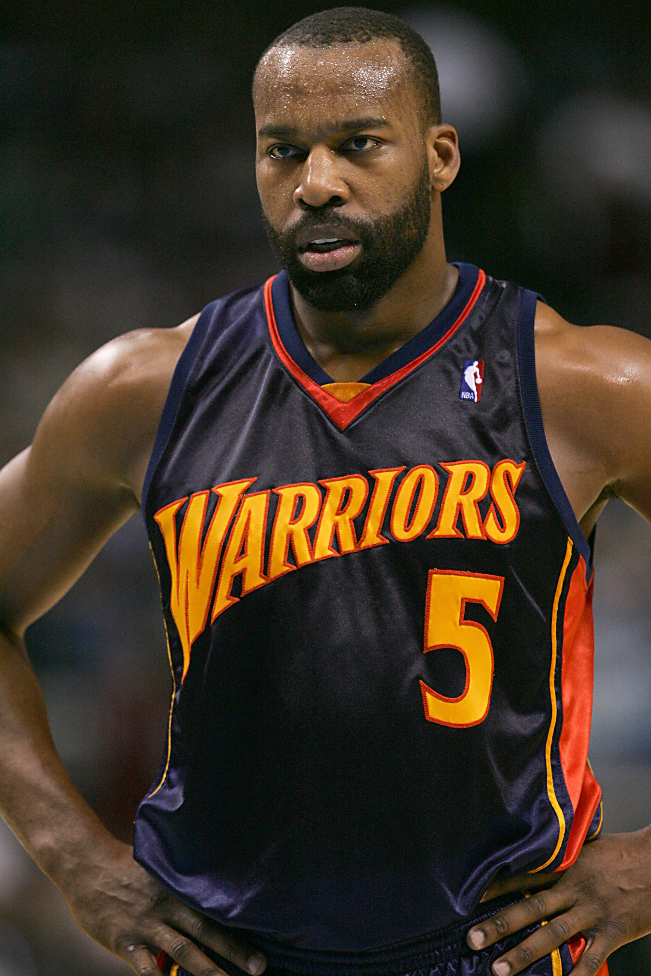DALLAS - JANUARY 2:  Baron Davis #5 of the Golden State Warriors looks on during the NBA game against the Dallas Mavericks at American Airlines Center on January 2, 2008 in Dallas, Texas.  The Mavs won 121-99.  NOTE TO USER: User expressly acknowledges an