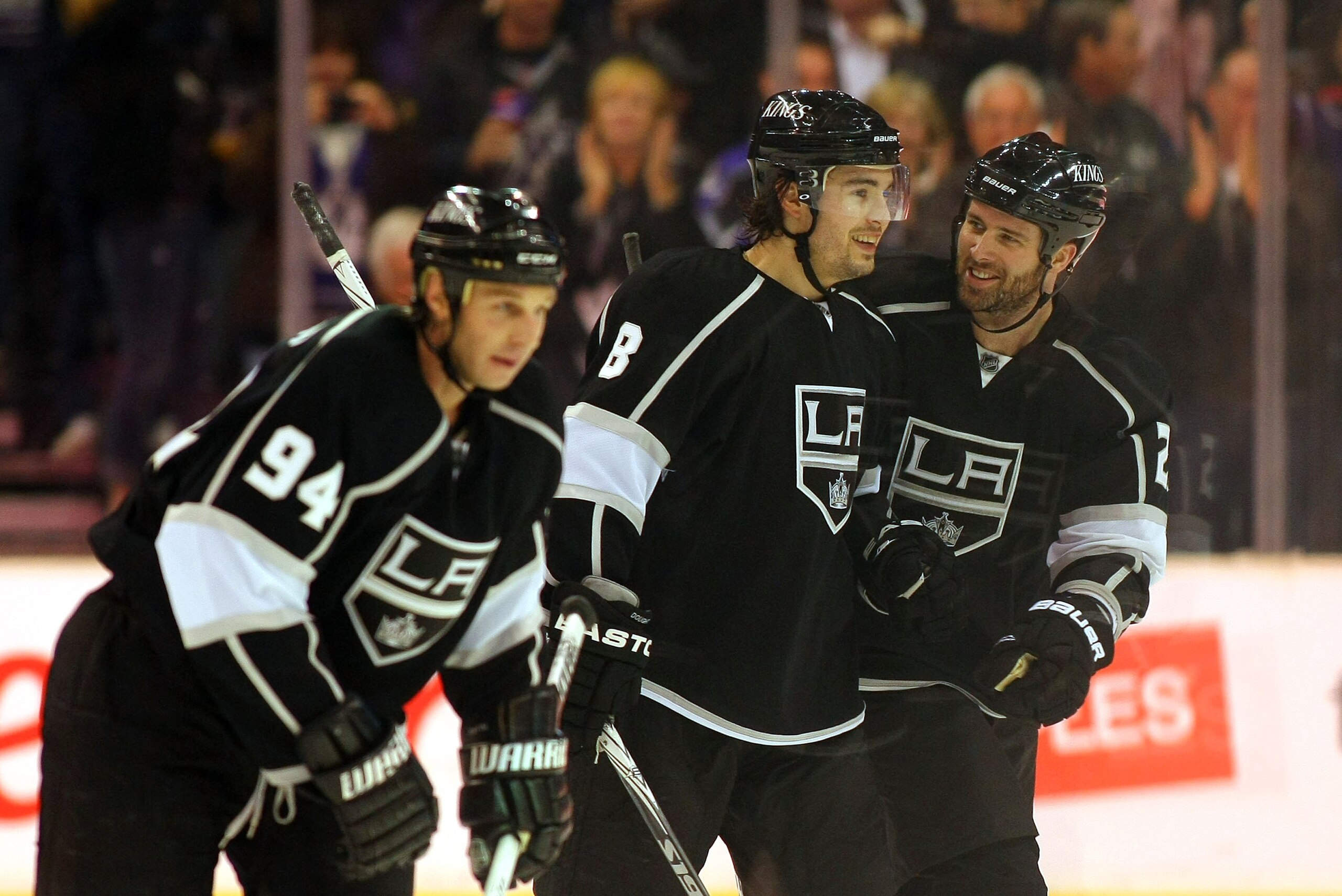 LOS ANGELES, CA - MARCH 03: Ryan Smyth #94, Drew Doughty #8 and Dustin Penner #25 of the Los Angeles Kings skate back to the bench after celebrating a goal by teammate Jarret Stoll #28 (not in photo) against the Phoenix Coyotes in the third period during LOS ANGELES, CA - MARCH 03: Ryan Smyth #94, Drew Doughty #8 and Dustin Penner #25 of the Los Angeles Kings skate back to the bench after celebrating a goal by teammate Jarret Stoll #28 (not in photo) against the Phoenix Coyotes in the third period during