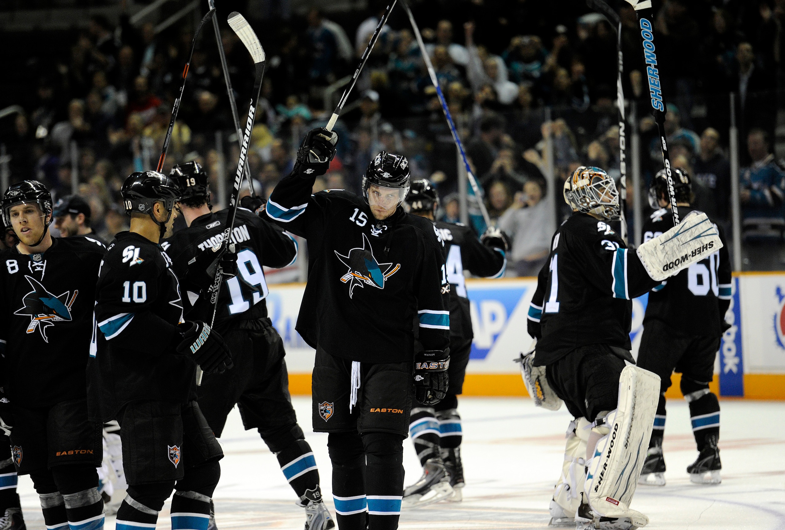 SAN JOSE, CA - MARCH 3: Dany Heatley #15 and his teammates of the San Jose Sharks salute the crowd after the Sharks defeated the Detroit Red Wings 3-1 in an NHL hockey game at the HP Pavilion on March 3, 2011 in San Jose, California. (Photo by Thearon W. SAN JOSE, CA - MARCH 3: Dany Heatley #15 and his teammates of the San Jose Sharks salute the crowd after the Sharks defeated the Detroit Red Wings 3-1 in an NHL hockey game at the HP Pavilion on March 3, 2011 in San Jose, California. (Photo by Thearon W.