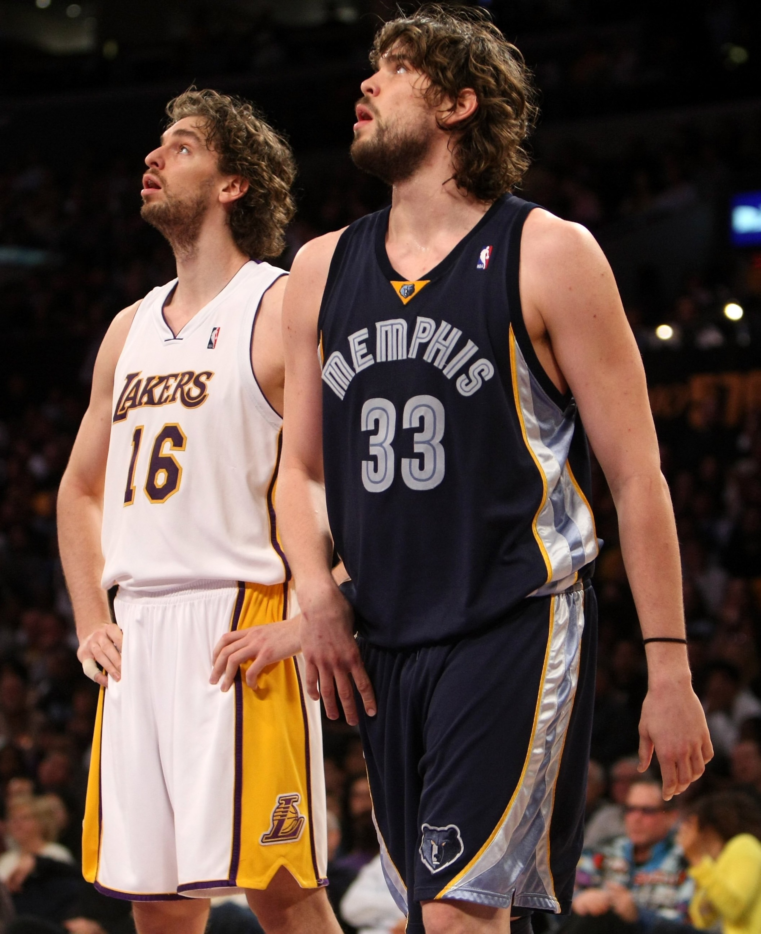 LOS ANGELES, CA - APRIL 12:  Marc Gasol #33 of the Memphis Grizzlies and Pau Gasol #16 of the Los Angeles Lakers wait for the play under the basket on April 12, 2009 at Staples Center in Los Angeles, California. NOTE TO USER: User expressly acknowledges a