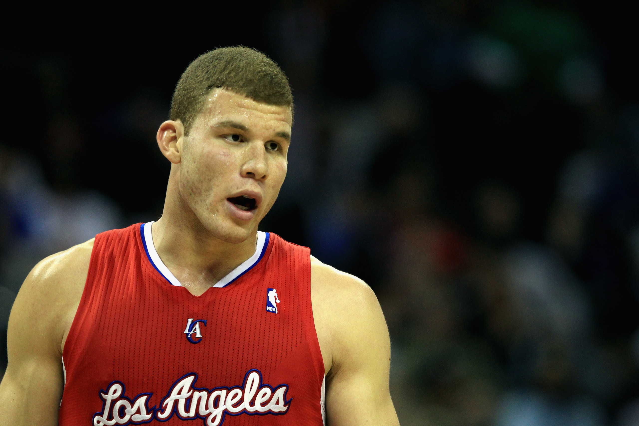 CHARLOTTE, NC - MARCH 07:  Blake Griffin #32 of the Los Angeles Clippers talks to a teamamte during their game against the Charlotte Bobcats at Time Warner Cable Arena on March 7, 2011 in Charlotte, North Carolina. NOTE TO USER: User expressly acknowledge