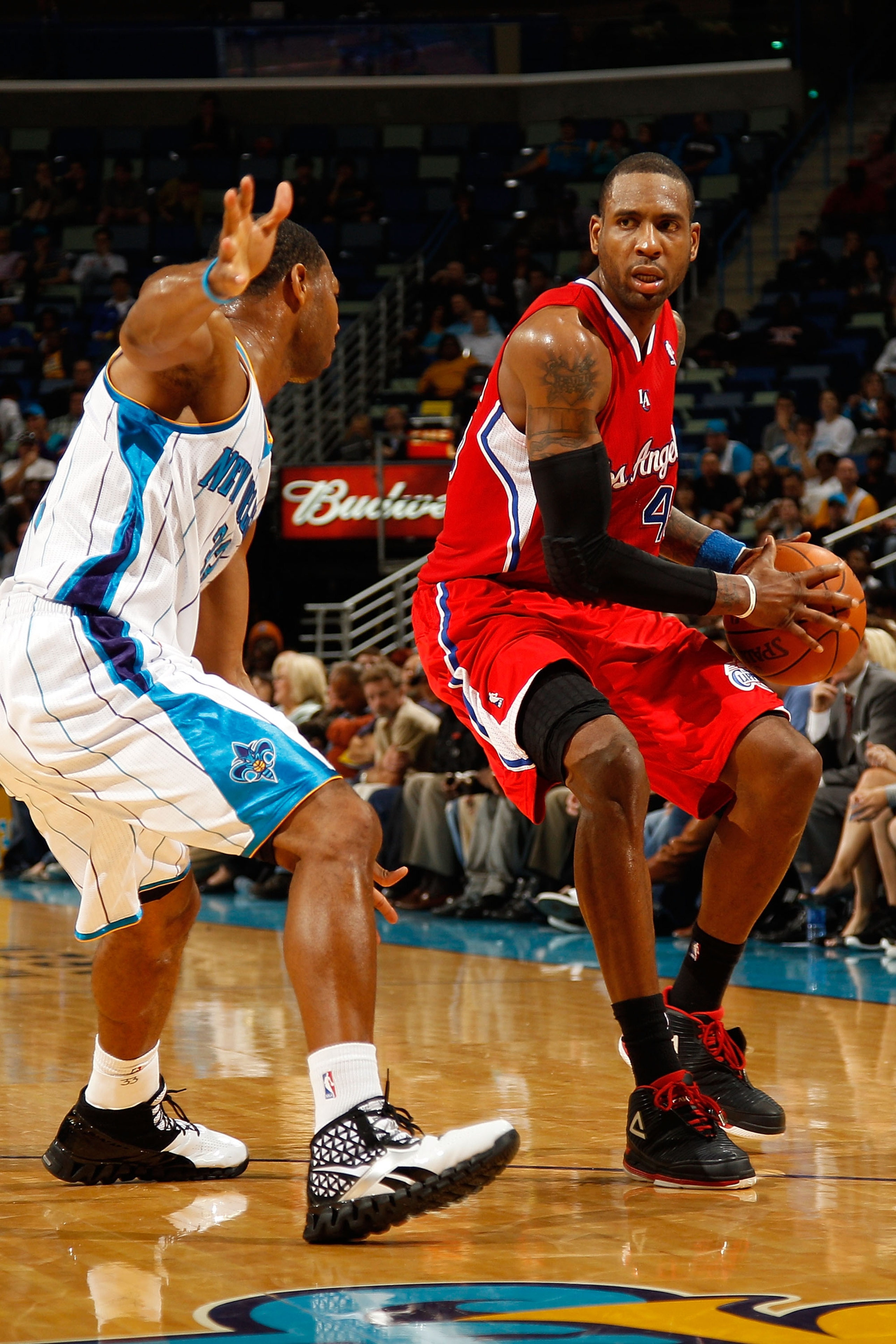 NEW ORLEANS - NOVEMBER 09:  Rasual Butler #45 of the Los Angeles Clippers drives the ball around Willie Green #32 of the New Orleans Hornets at the New Orleans Arena on November 9, 2010 in New Orleans, Louisiana. The Hornets defeated the Clippers 101-82.