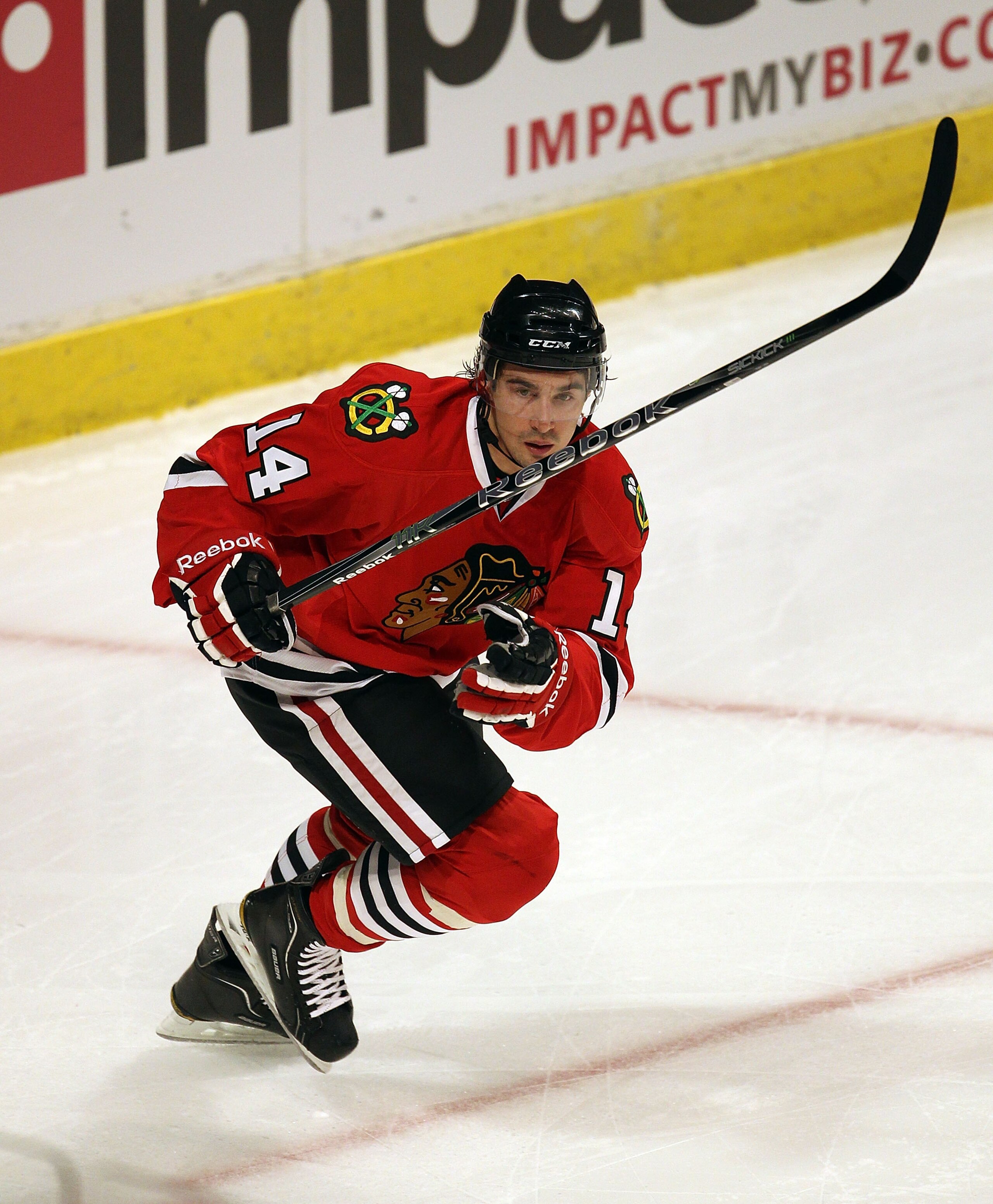 CHICAGO, IL - MARCH 02: Chris Campoli #14 of the Chicago Blackhawks skates against the Calgary Flames at the United Center on March 2, 2011 in Chicago, Illinois. The Blackhawks defeated the Flames 6-4. (Photo by Jonathan Daniel/Getty Images)