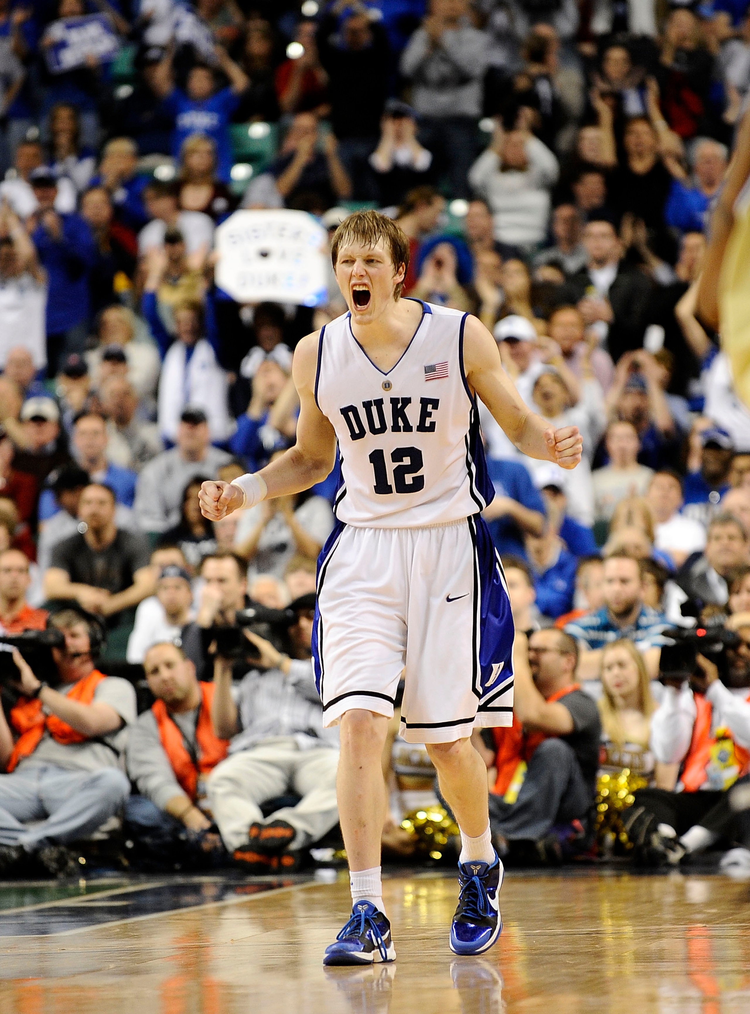 GREENSBORO, NC - MARCH 14:  Kyle Singler #12 Duke Blue Devils reacts against the Georgia Tech Yellow Jackets in the championship game of the 2010 ACC Men's Basketball Tournament at the Greensboro Coliseum on March 14, 2010 in Greensboro, North Carolina.