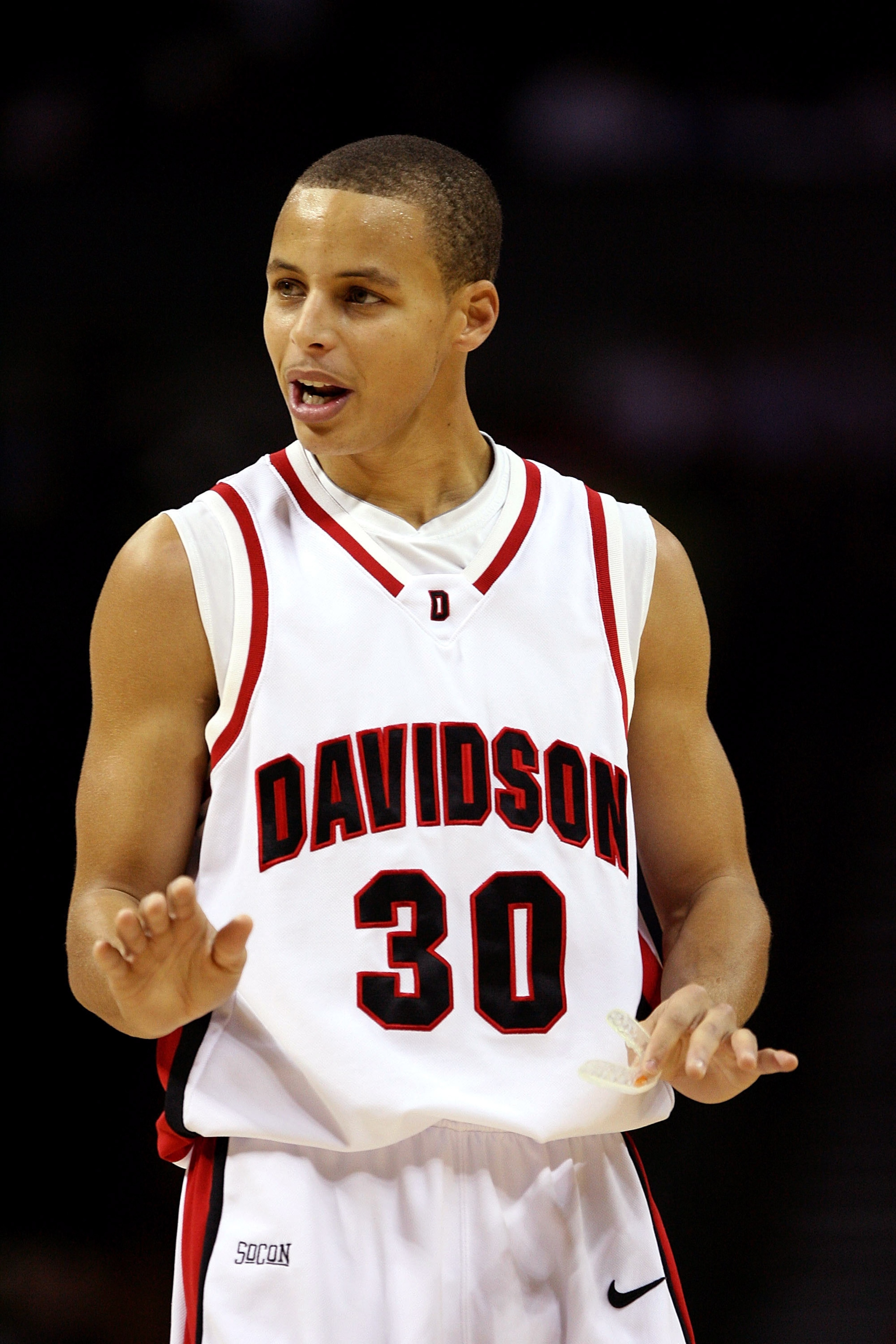CHARLOTTE, NC - DECEMBER 06:  Stephen Curry #30 of the Davidson Wildcats watches on during their game against the North Carolina State Wolfpack at Time Warner Cable Arena on December 6, 2008 in Charlotte, North Carolina.  (Photo by Streeter Lecka/Getty Im