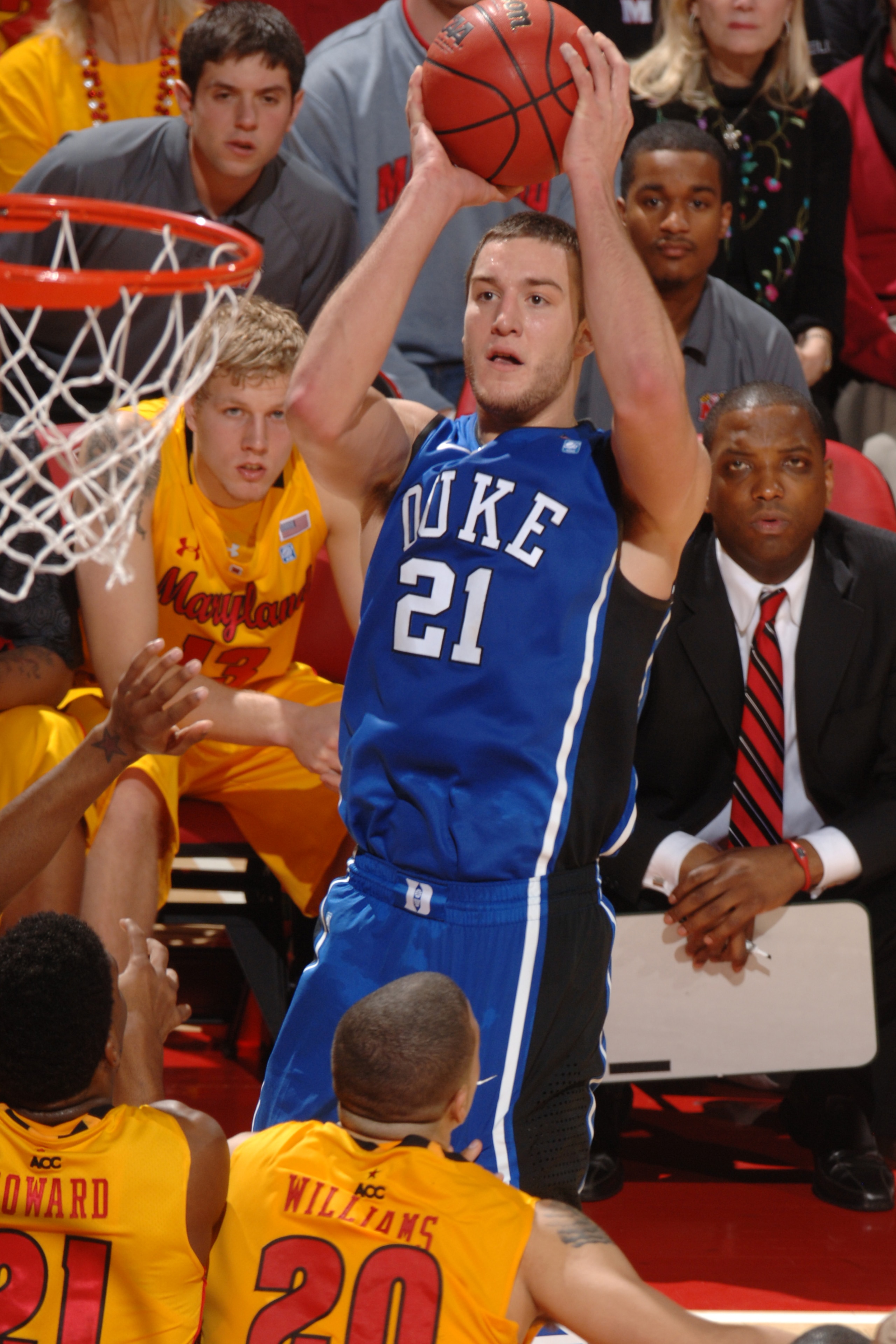 COLLEGE PARK, MD - FEBRUARY 2: Miles Plumlee #21 of the Duke Blue Devils takes a jump shot during a college basketball game against the Maryland Terrapins on February 2, 2011 at the Comcast Arena in College Park, Maryland. The Blue Devils won 80-62. (Phot