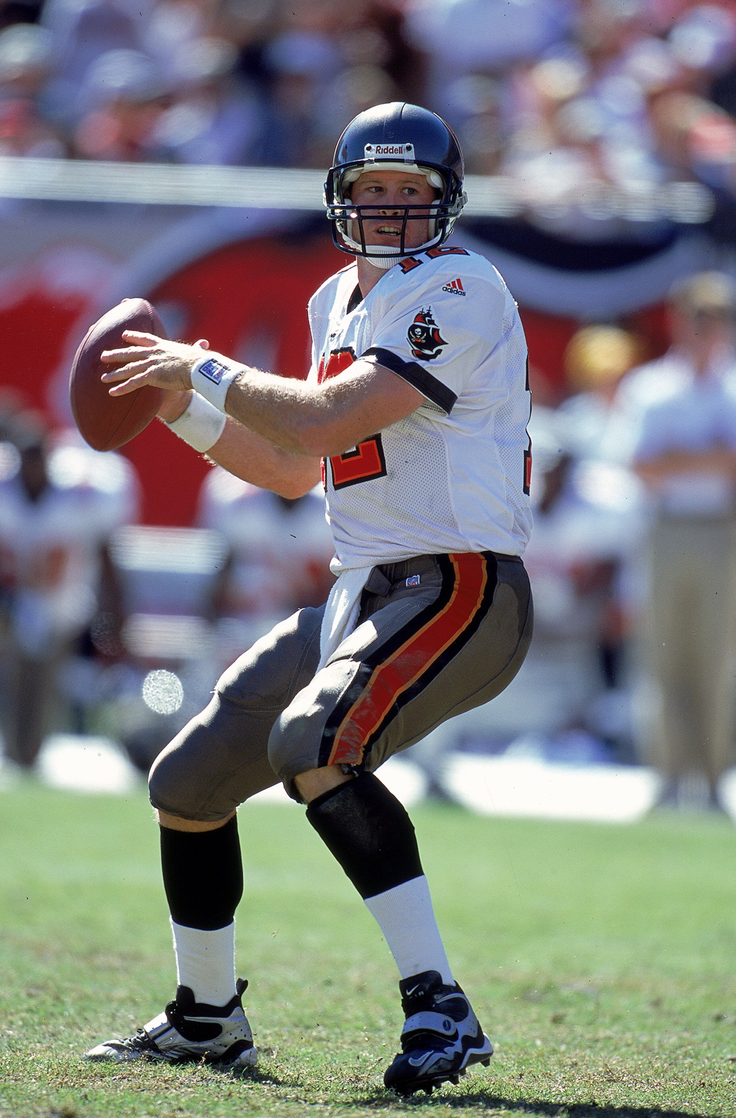 24 Oct 1999: Trent Dilfer #12 of the Tampa Bay Buccaneers moves back to pass the ball during the game against the Chicago Bears at the Raymond James Stadium in Tampa, Florida. The Buccaneers defeated the Bears 6-3.