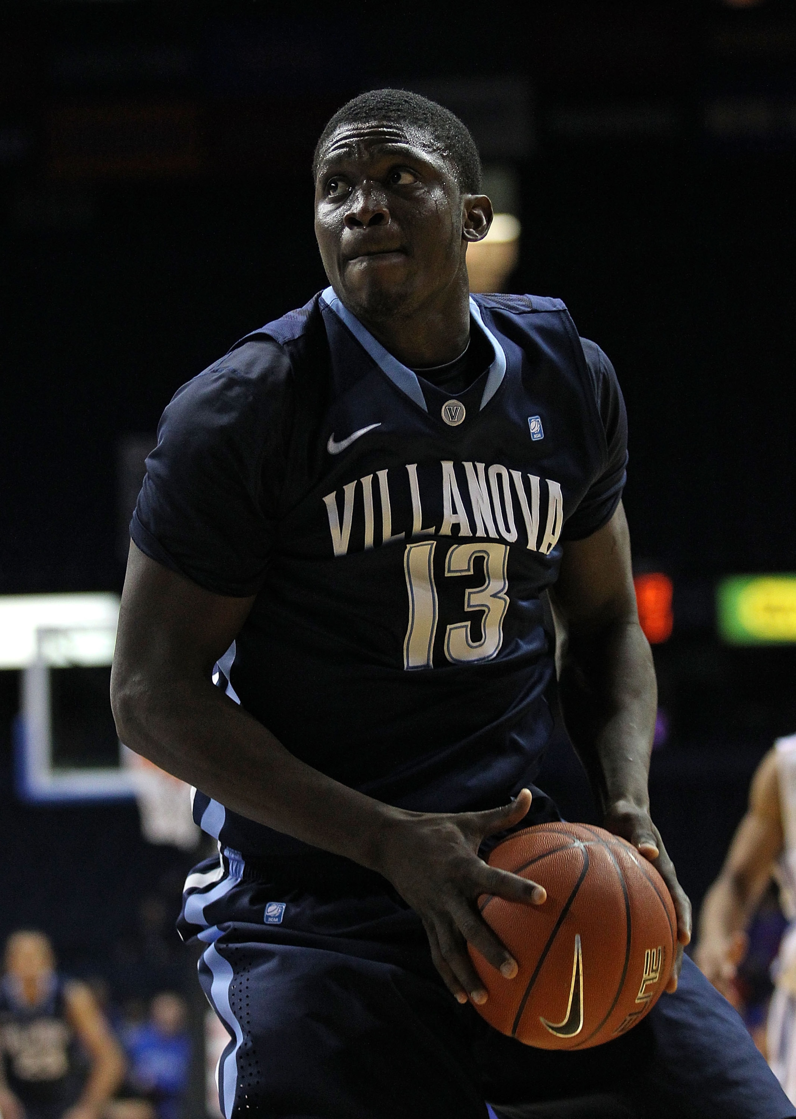 ROSEMONT, IL - FEBRUARY 19: Mouphtaou Yarou #13 of the Villanova Wildcats moves to shoot against the DePaul Blue Demons at the Allstate Arena on February 19, 2011 in Rosemont, Illinois. Villanova defeated DePaul 77-75 in overtime. (Photo by Jonathan Danie