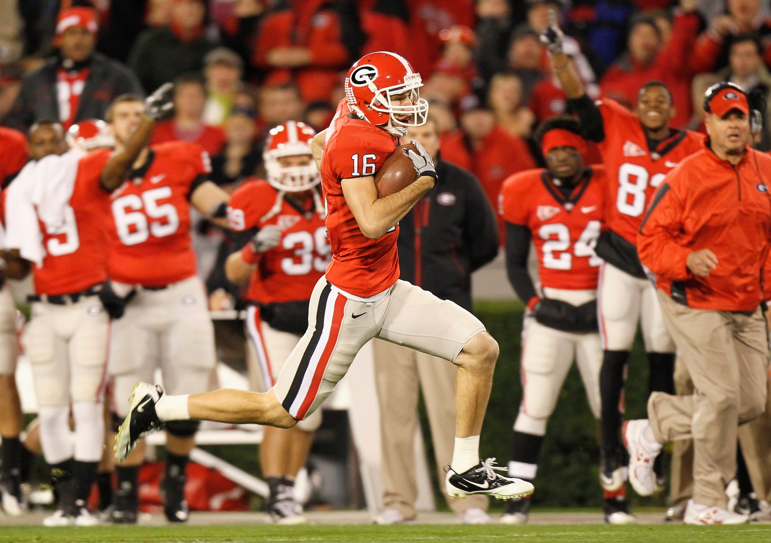 ATHENS, GA - NOVEMBER 27: Kris Durham #16 of the Georgia Bulldogs takes this reception down the field for a touchdown against the Georgia Tech Yellow Jackets at Sanford Stadium on November 27, 2010 in Athens, Georgia. (Photo by Kevin C. Cox/Getty Images ATHENS, GA - NOVEMBER 27: Kris Durham #16 of the Georgia Bulldogs takes this reception down the field for a touchdown against the Georgia Tech Yellow Jackets at Sanford Stadium on November 27, 2010 in Athens, Georgia. (Photo by Kevin C. Cox/Getty Images