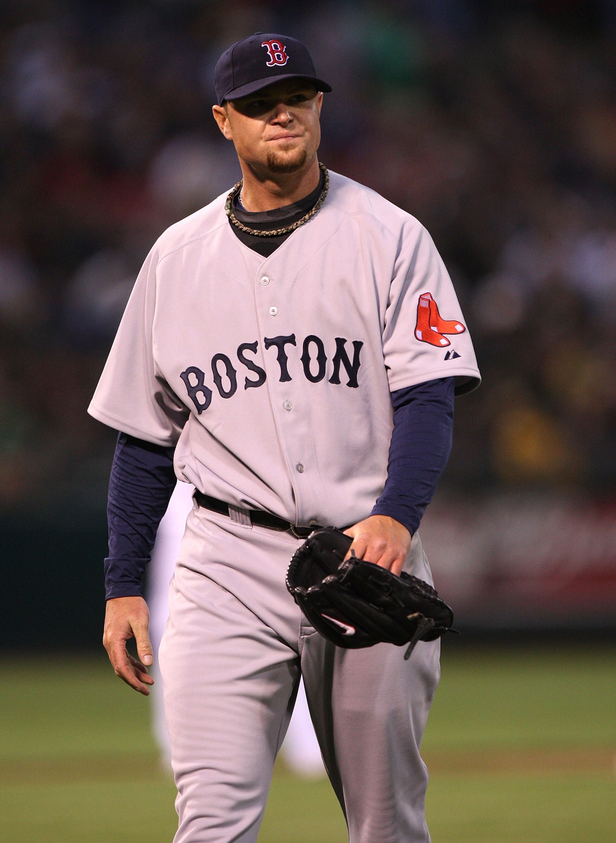 OAKLAND, CA - APRIL 13:  John Lester #31 of the Boston Red Sox walks off the field after giving up four runs in the second inning against the Oakland Athletics during a Major League Baseball game on April 13, 2009 at the Oakland Coliseum in Oakland, Calif