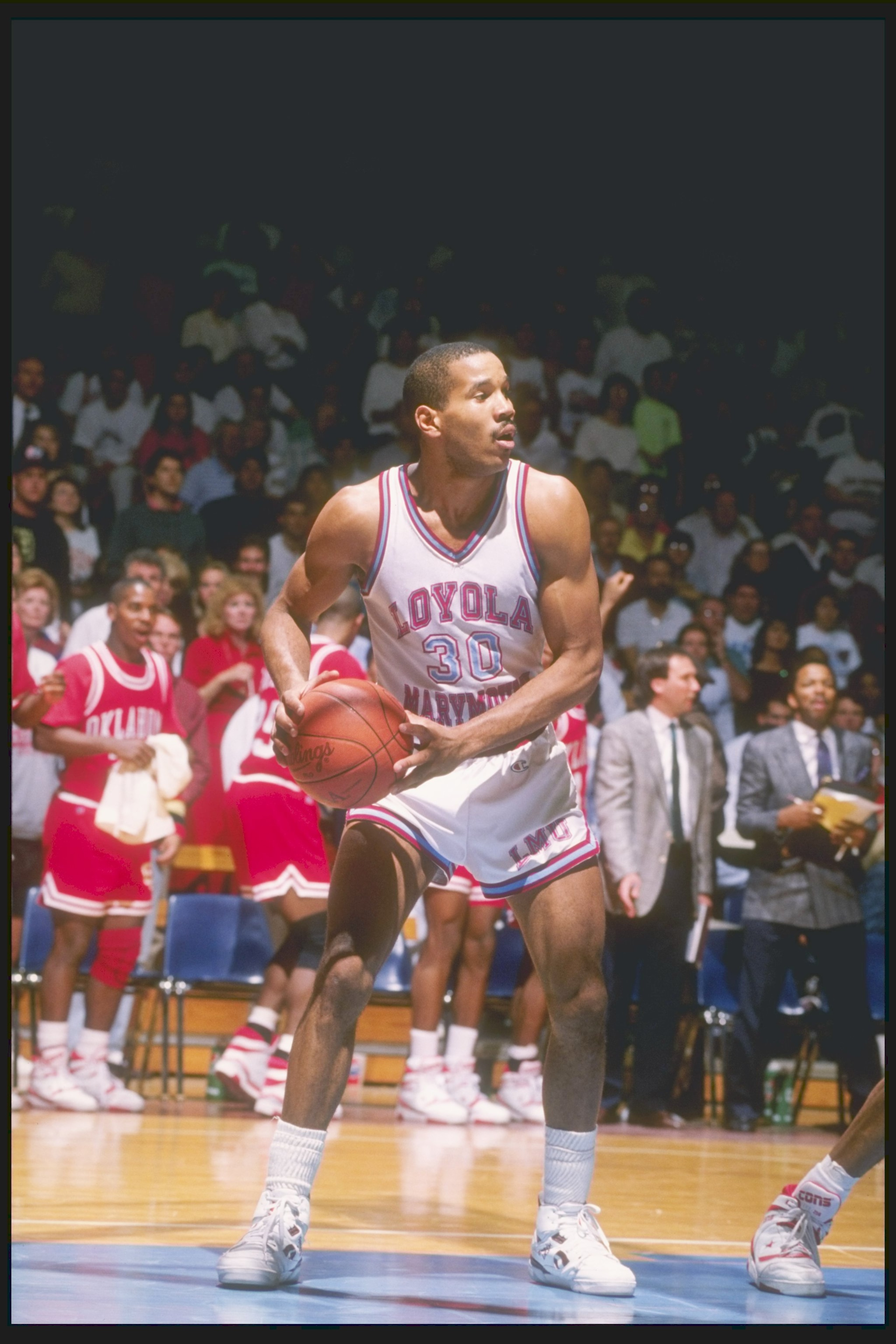 1990:  Guard Bo Kimble of the Loyola-Marymount Lions holds the ball during a game. Mandatory Credit: Mike Powell  /Allsport