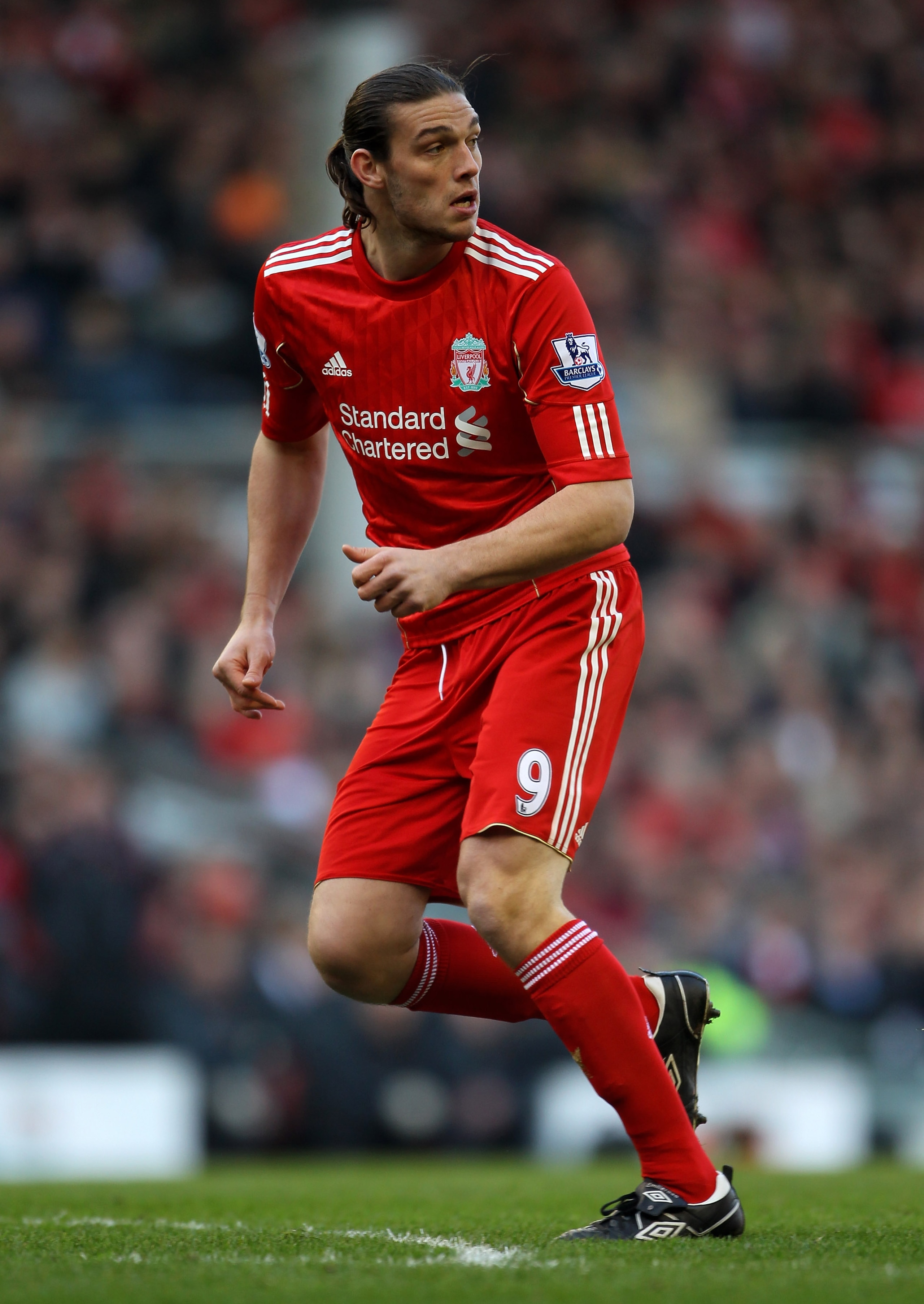 LIVERPOOL, ENGLAND - MARCH 06:  Andy Carroll of Liverpool in action during the Barclays Premier League match between Liverpool and Manchester United at Anfield on March 6, 2011 in Liverpool, England.  (Photo by Alex Livesey/Getty Images)