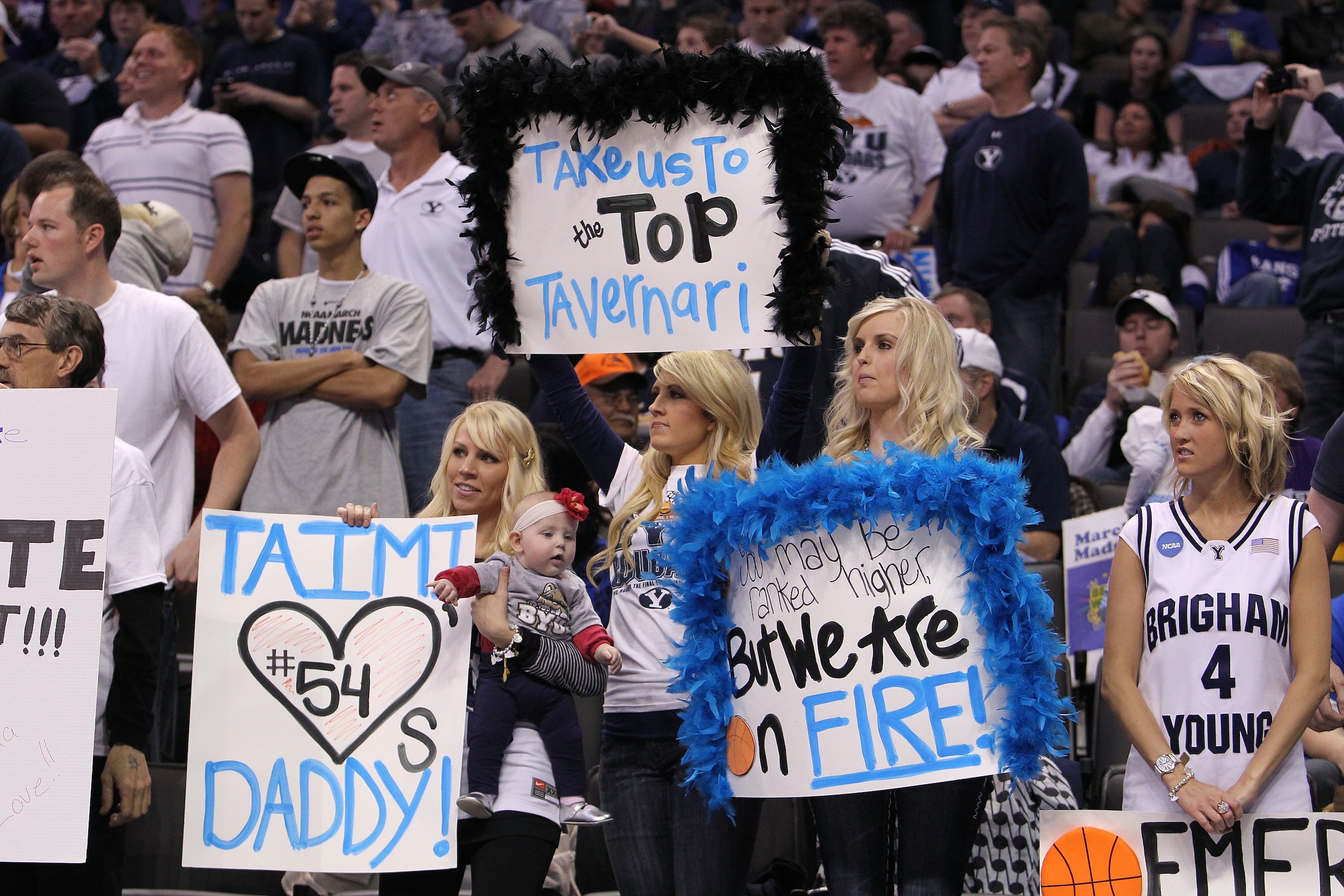 OKLAHOMA CITY - MARCH 20:  Fans of  the Brigham Young Cougars hold signs in support of their team's players including Chris Miles #54, Jonathan Tavernari #45, Jackson Emery #4 and Jimmer Fredette #32 against the Kansas State Wildcats during the second rou